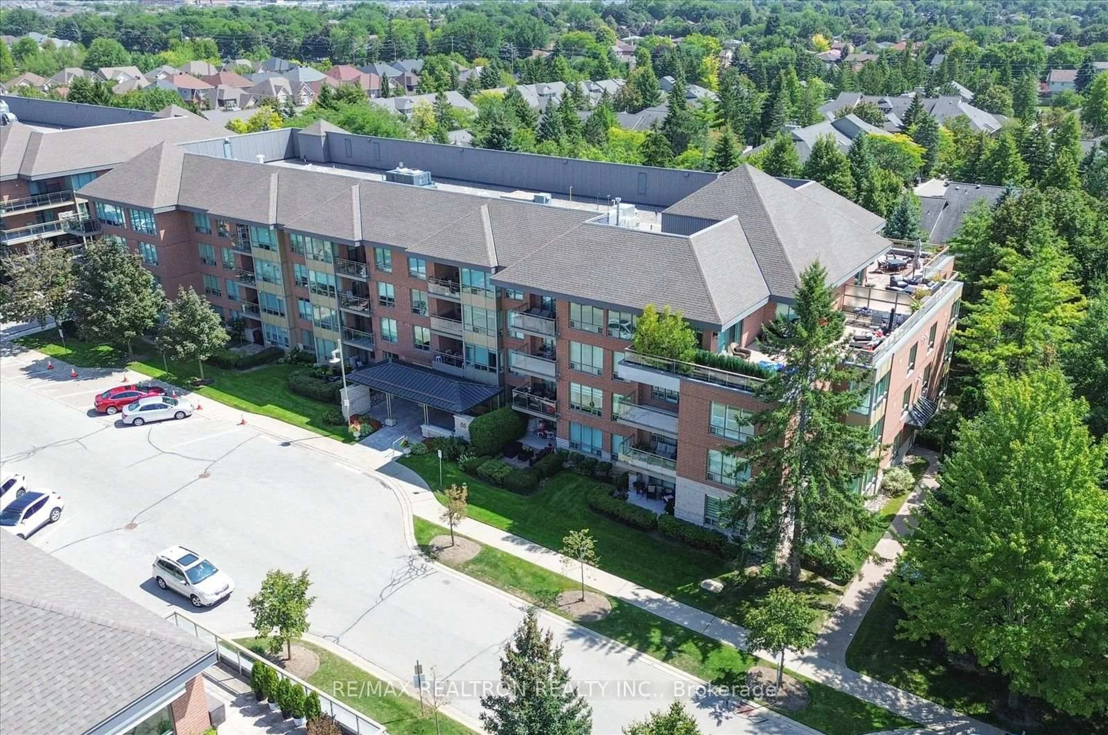 A pic from outside/outdoor area/front of a property/back of a property/a pic from drone, city buildings view from balcony for 55 The Boardwalk Way #307, Markham Ontario L6E 1B7