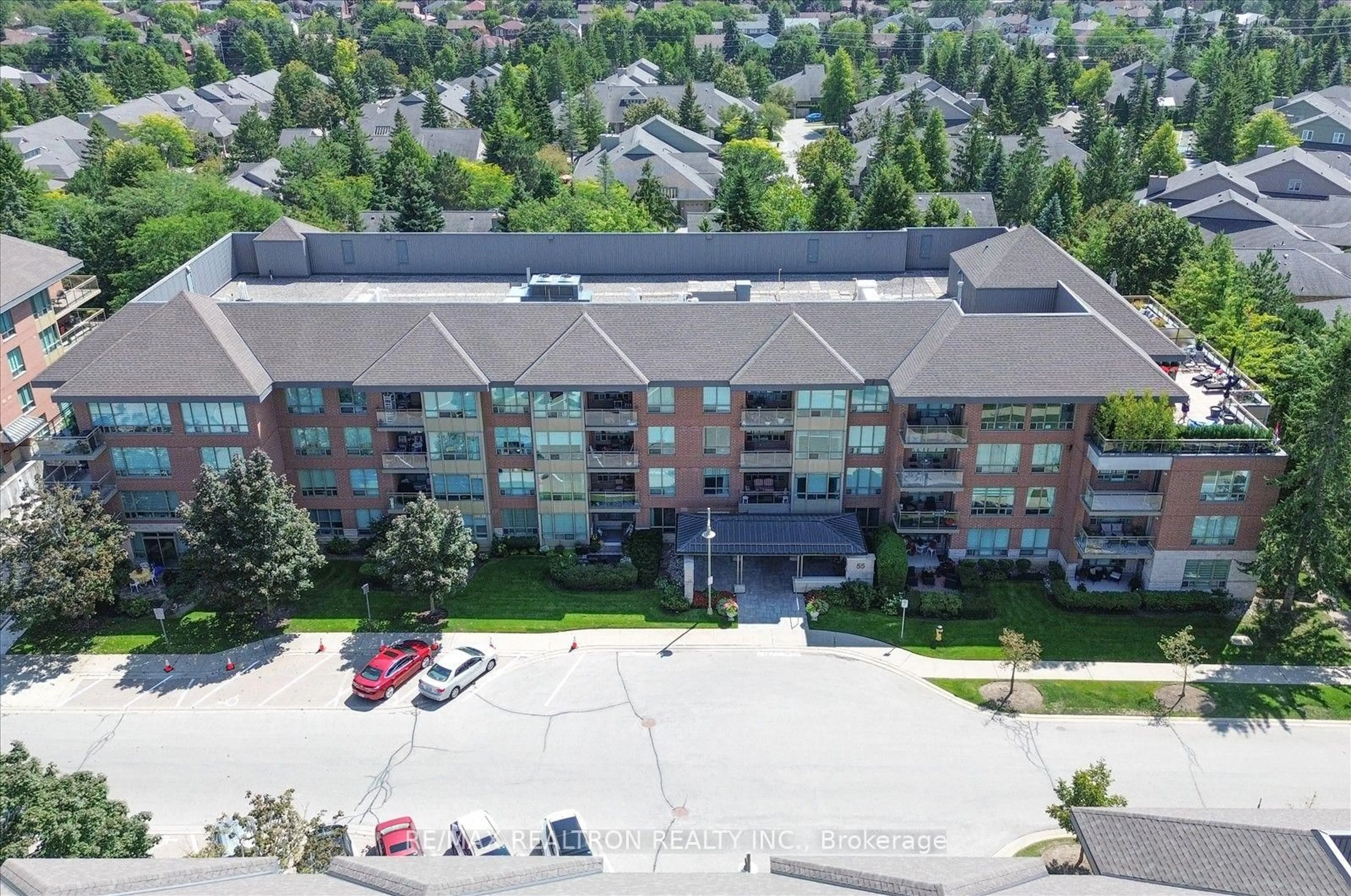 A pic from outside/outdoor area/front of a property/back of a property/a pic from drone, unknown for 55 The Boardwalk Way #307, Markham Ontario L6E 1B7