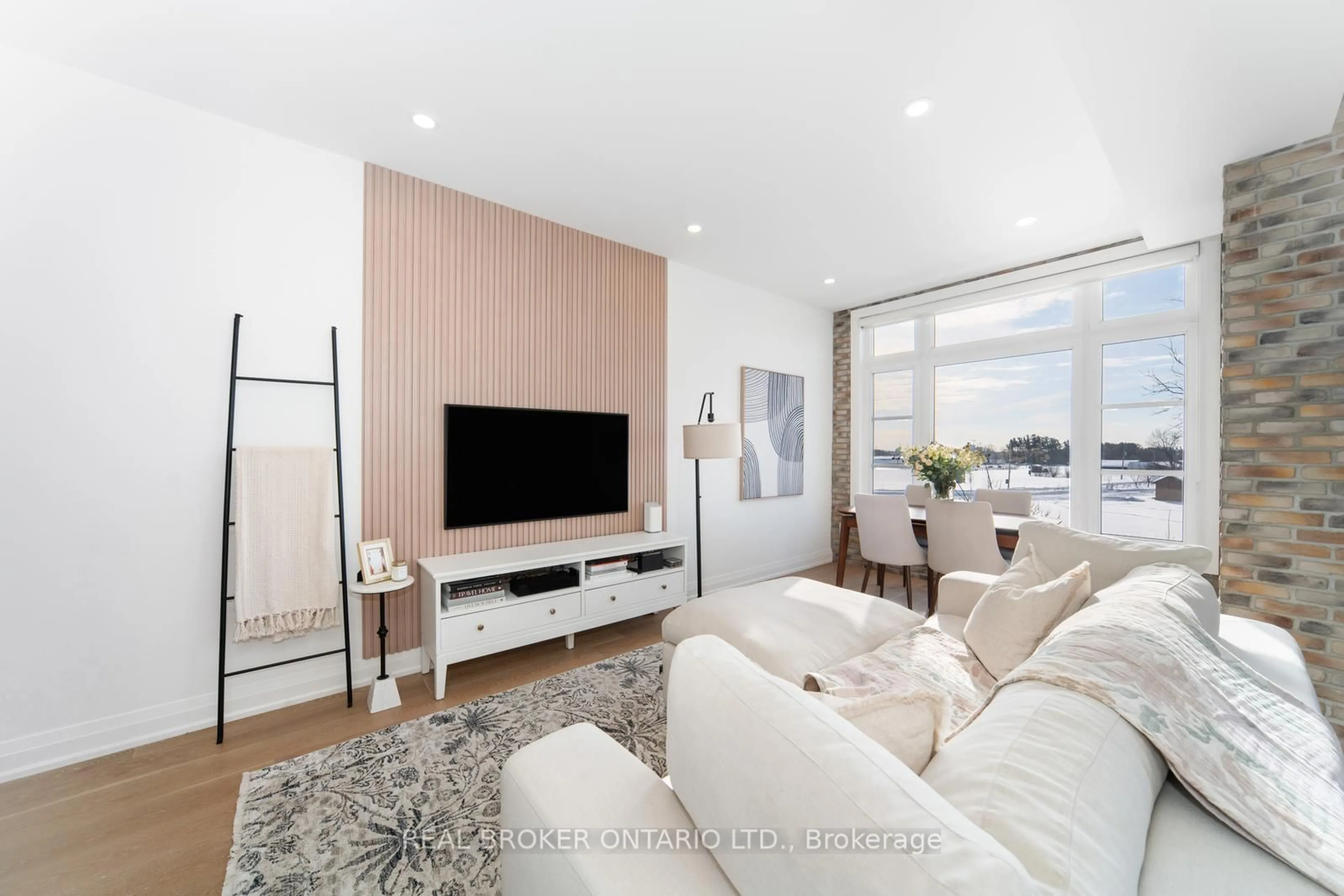 Living room with furniture, wood/laminate floor for 8167 Kipling Ave #48, Vaughan Ontario L4L 0G4