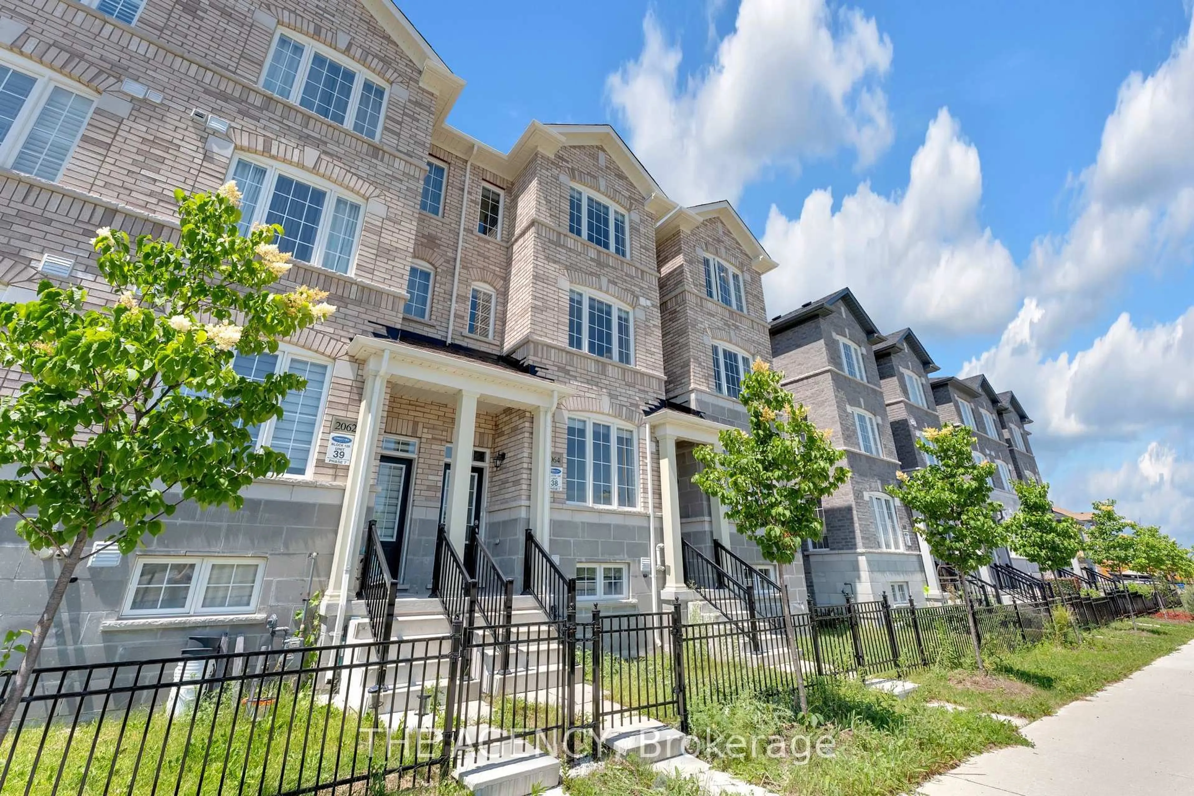 Home with brick exterior material, street for 2064 Donald Cousens Pkwy, Markham Ontario L6B 0Z3