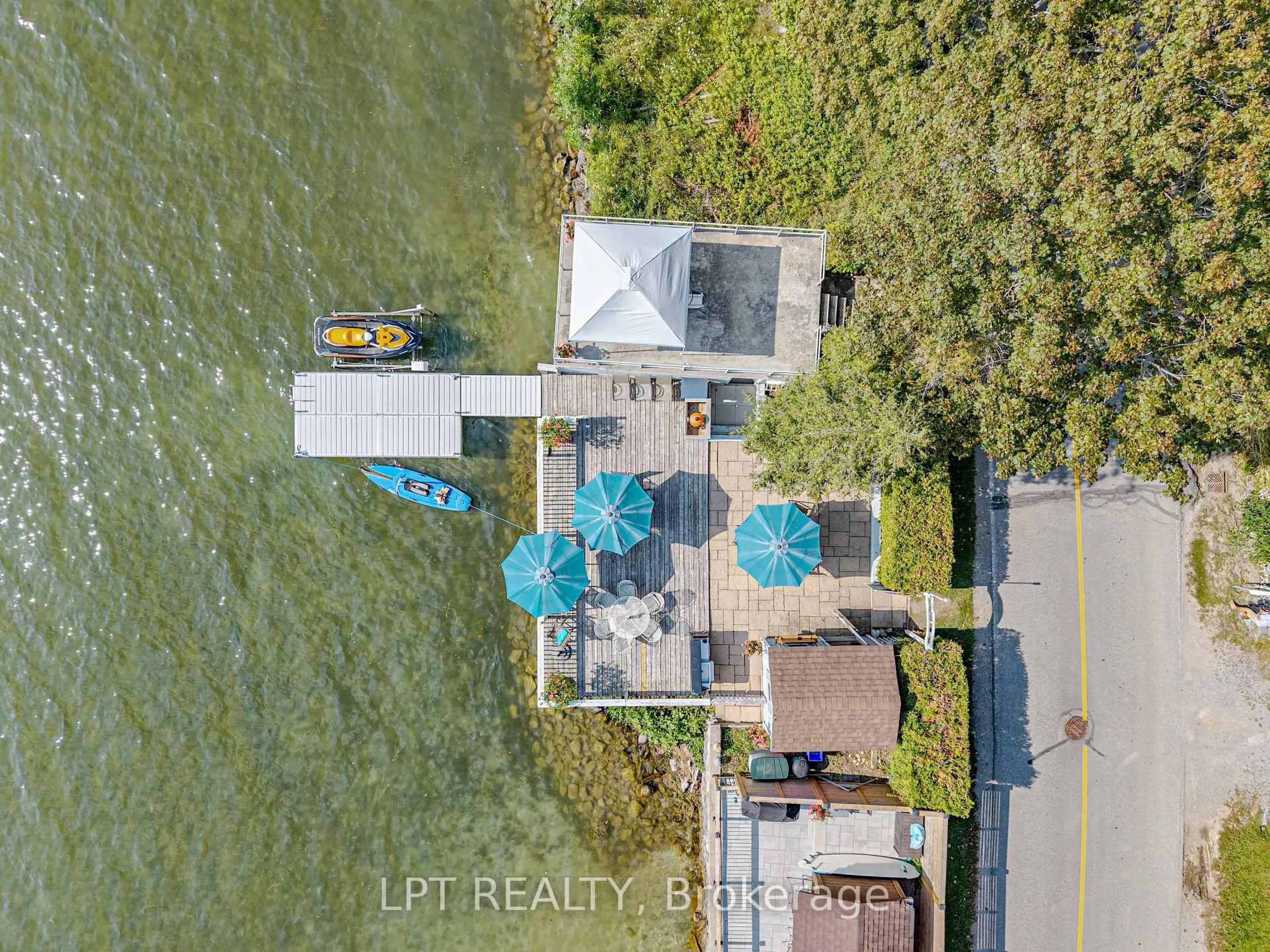 A pic from outside/outdoor area/front of a property/back of a property/a pic from drone, water/lake/river/ocean view for 357 Lake Dr, Georgina Ontario L4P 3C8