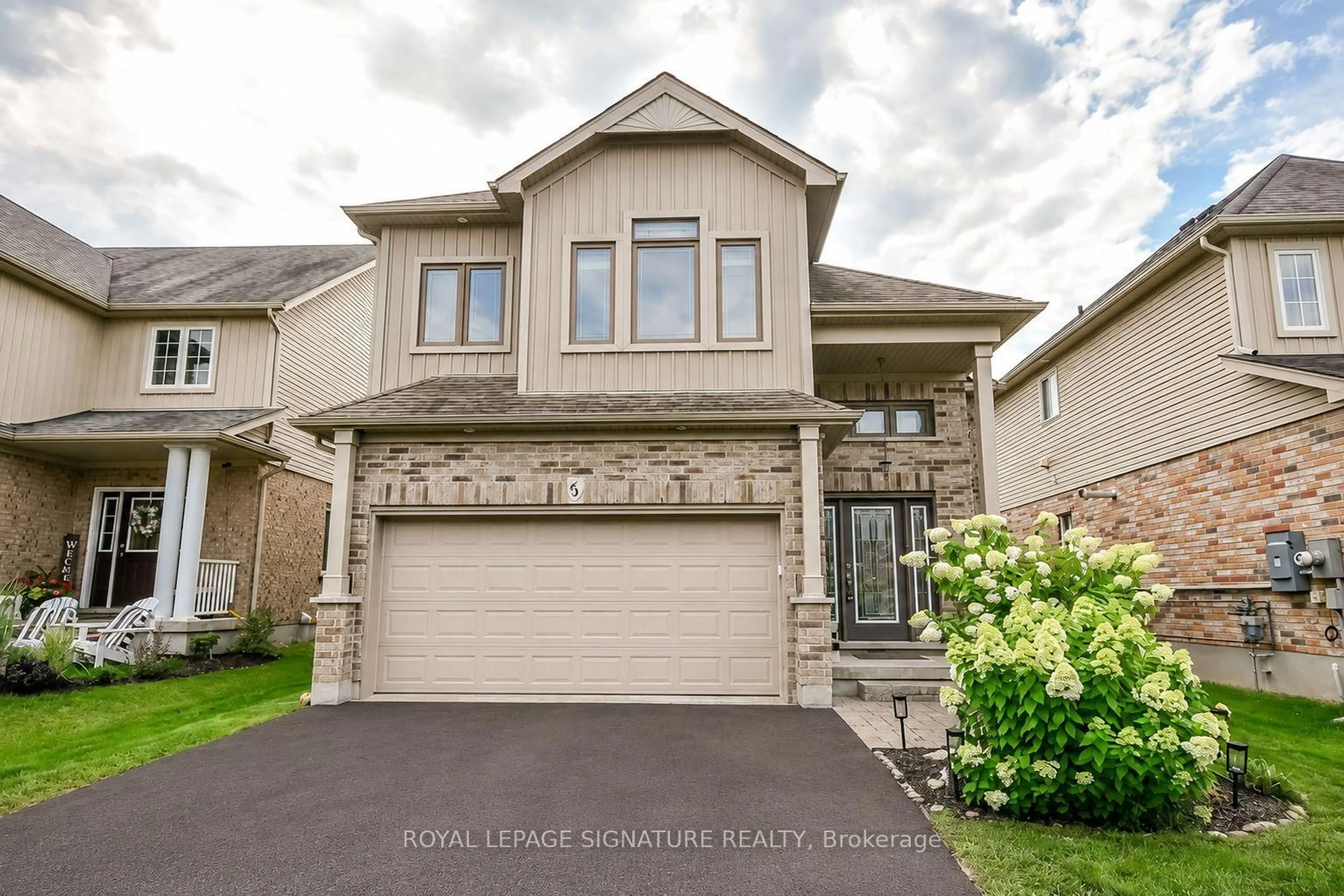 Home with vinyl exterior material, street for 63 Quigley St, Essa Ontario L0M 1B6