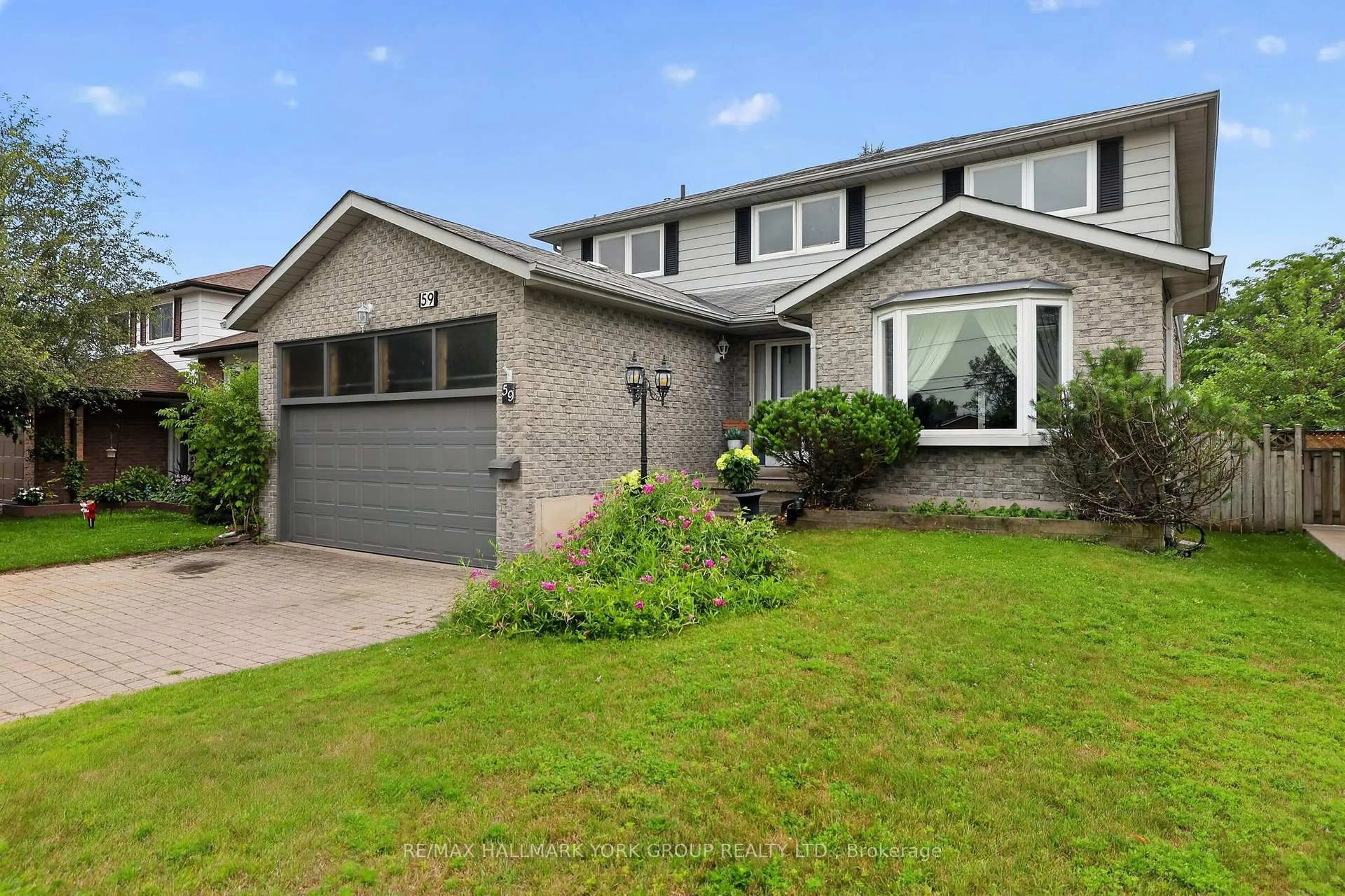 Home with brick exterior material, street for 59 Riverglen Dr, Georgina Ontario L4P 3K7