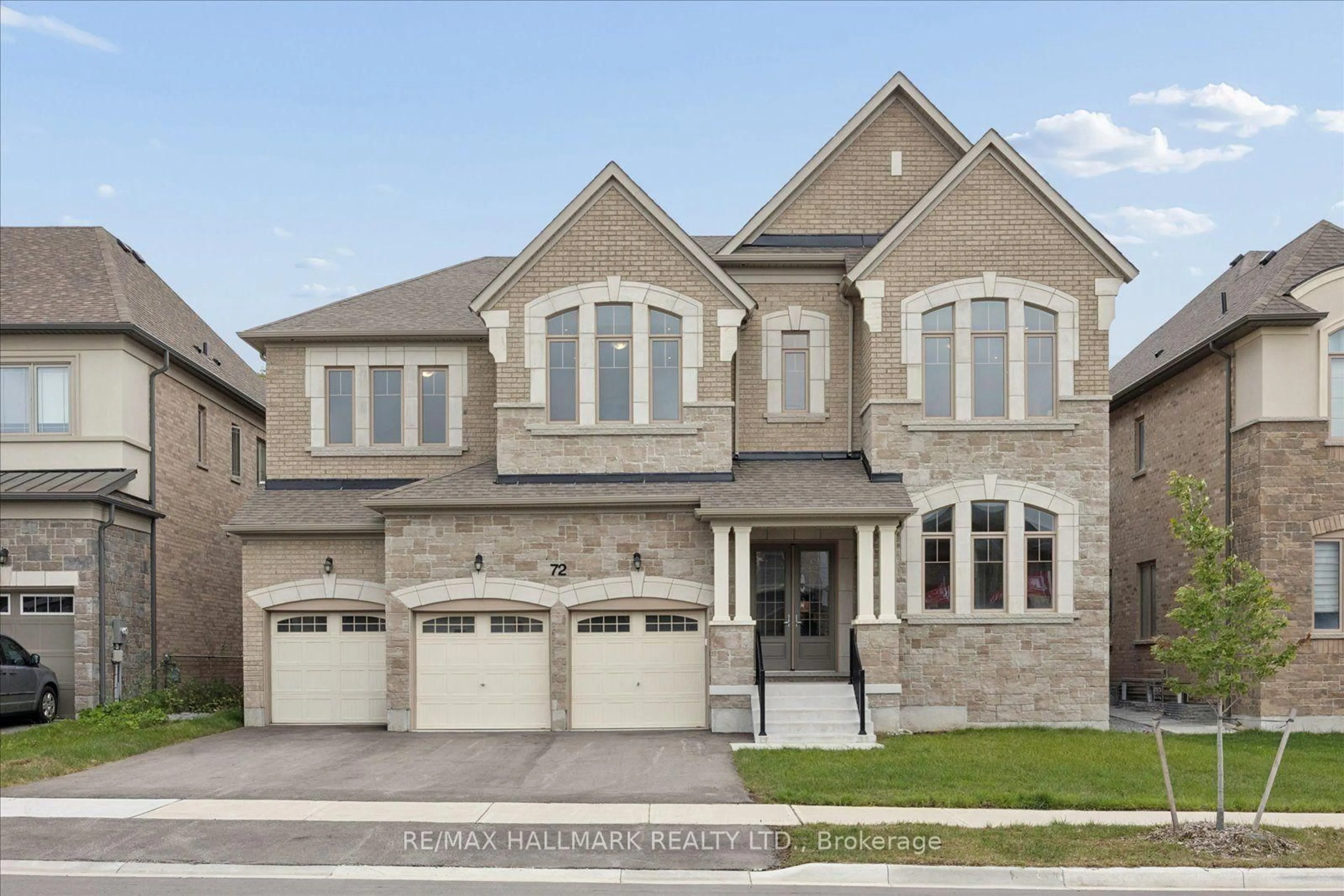 Home with brick exterior material, street for 72 Silk Twist Dr, East Gwillimbury Ontario L9N 0W4