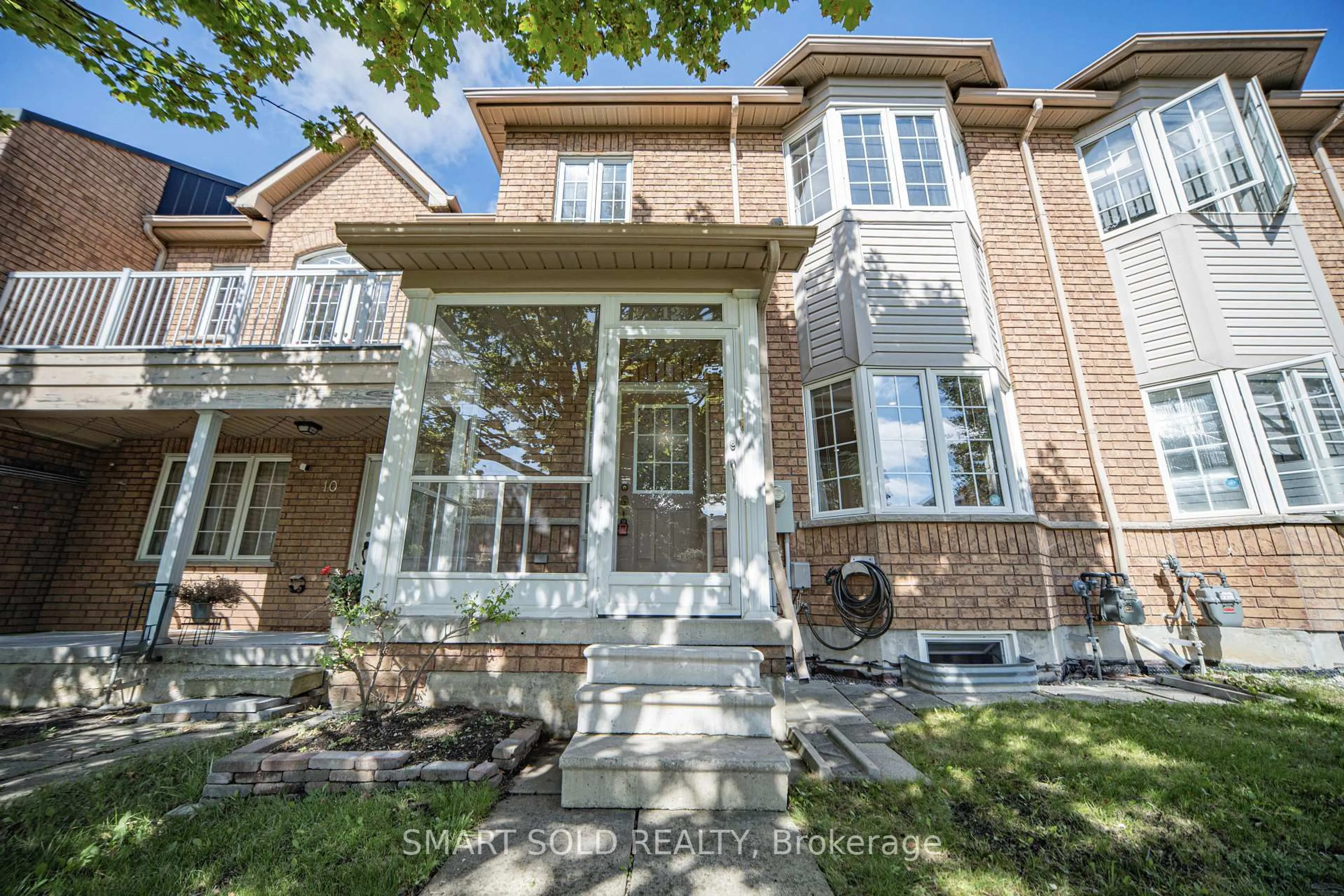 Home with brick exterior material, street for 12 John Gary Dr, Markham Ontario L3R 5G9