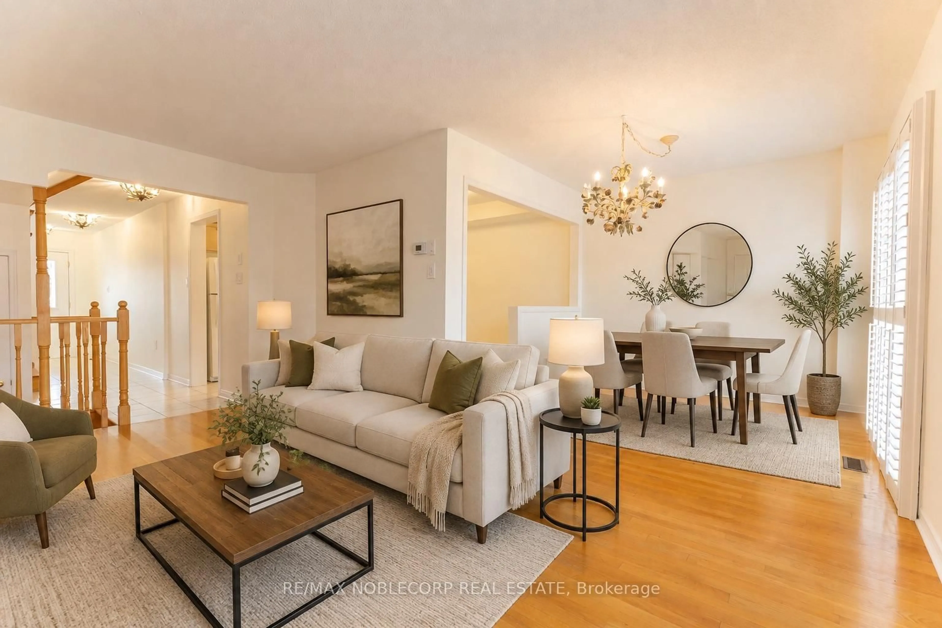 Living room with furniture, wood/laminate floor for 28 Opera Pl, Vaughan Ontario L4L 8Y8