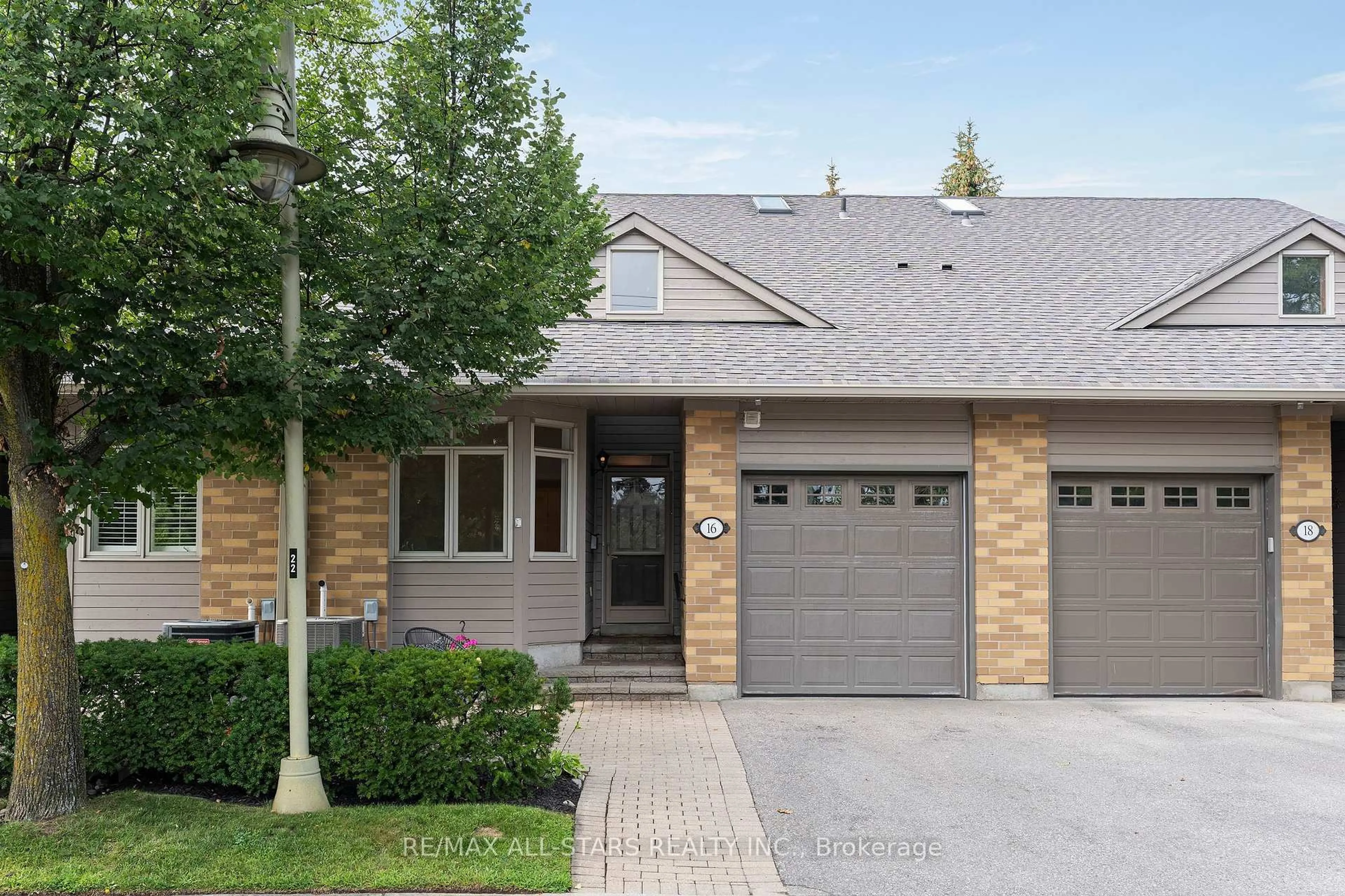 Home with brick exterior material, street for 16 Kingfisher Cove Way, Markham Ontario L6E 1B4