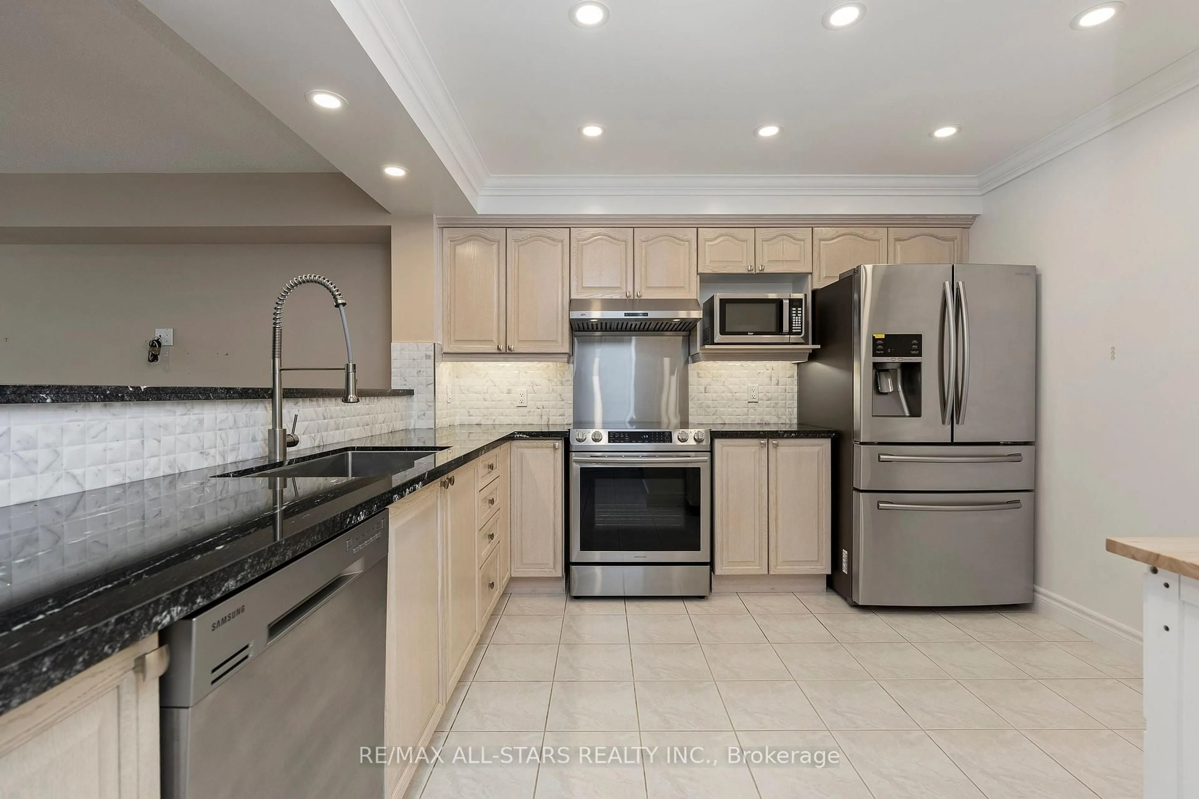 Open concept kitchen, ceramic/tile floor for 50 The Boardwalk Way #211, Markham Ontario L6E 1B6
