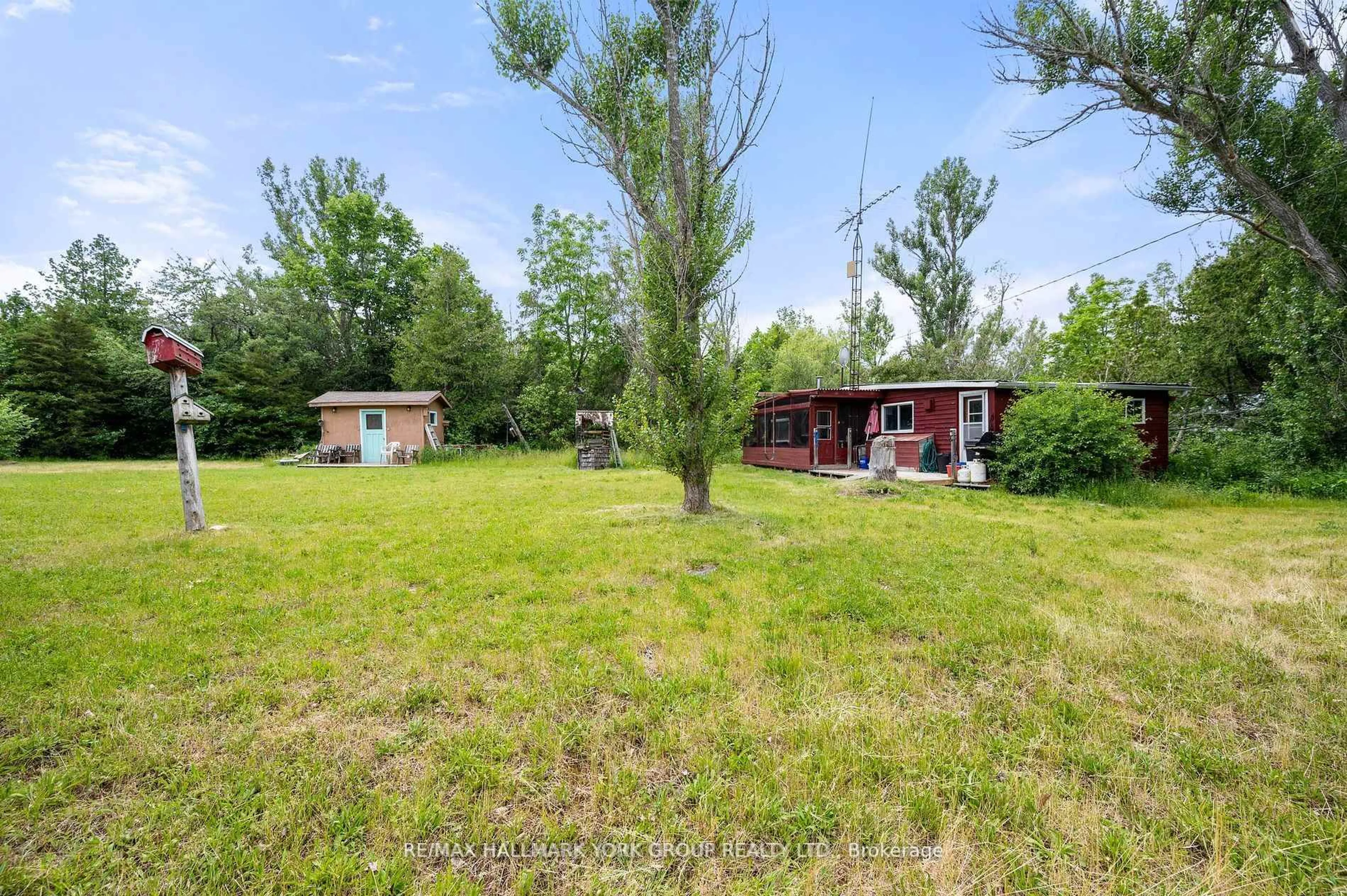 A pic from outside/outdoor area/front of a property/back of a property/a pic from drone, unknown for 40630 Shore Rd, Brock Ontario L0K 1A0