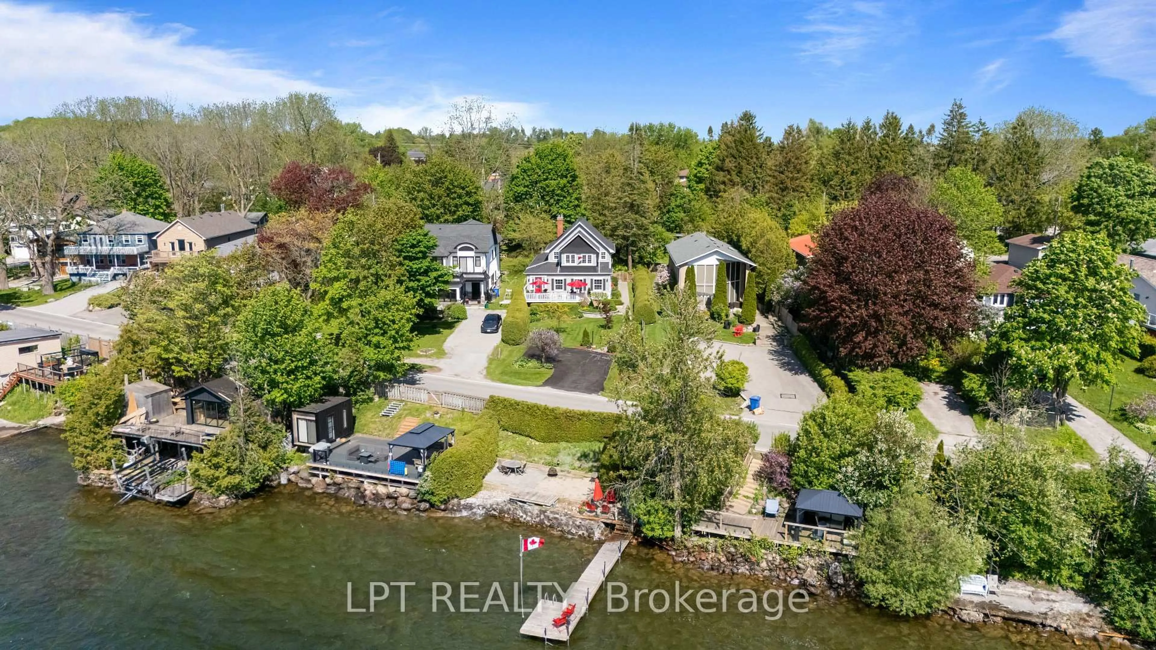 A pic from outside/outdoor area/front of a property/back of a property/a pic from drone, water/lake/river/ocean view for 145 Lake Dr, Georgina Ontario L4P 3C8