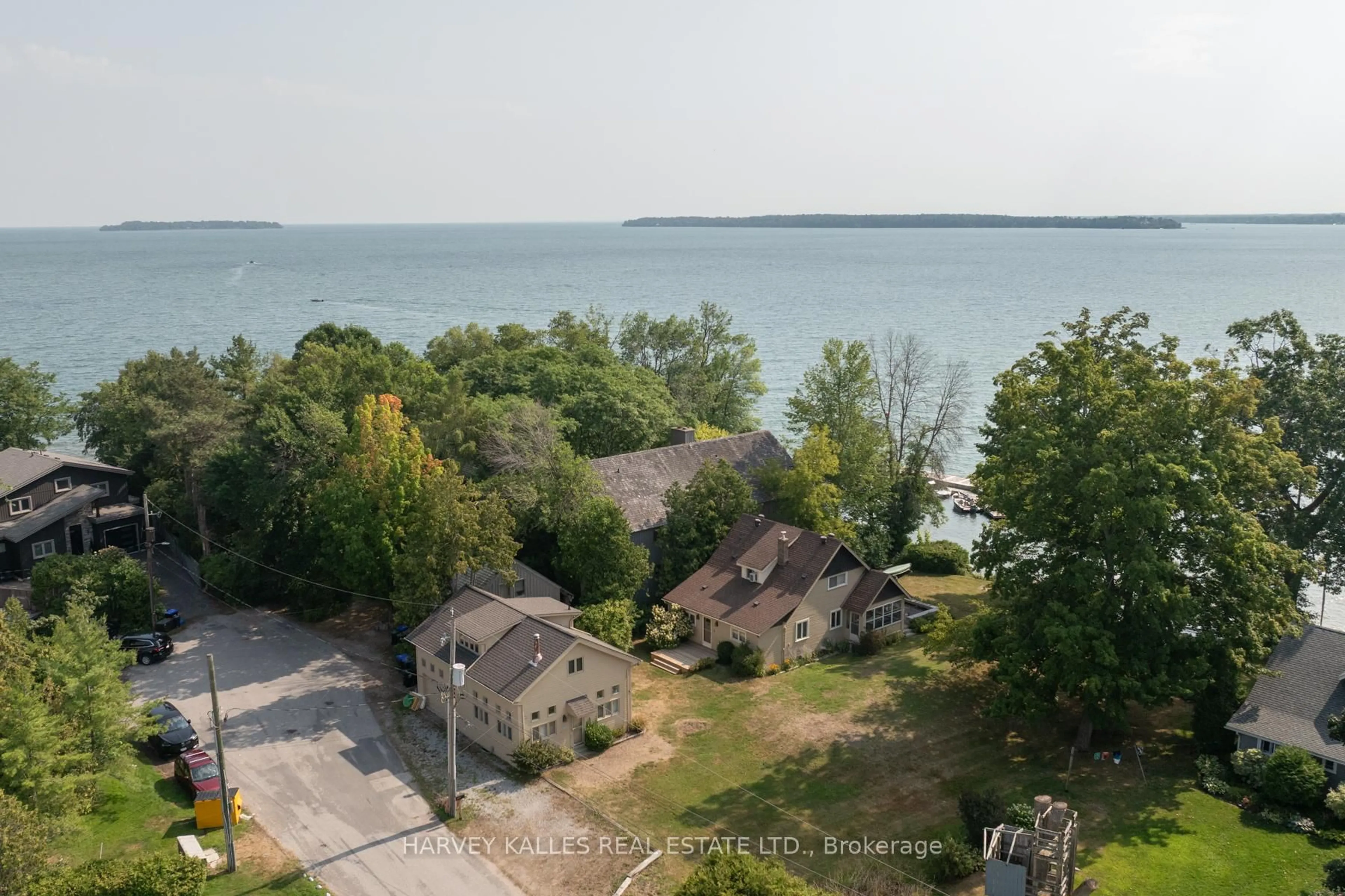 A pic from outside/outdoor area/front of a property/back of a property/a pic from drone, water/lake/river/ocean view for 607 Cedarvale Dr, Innisfil Ontario L9S 4L1