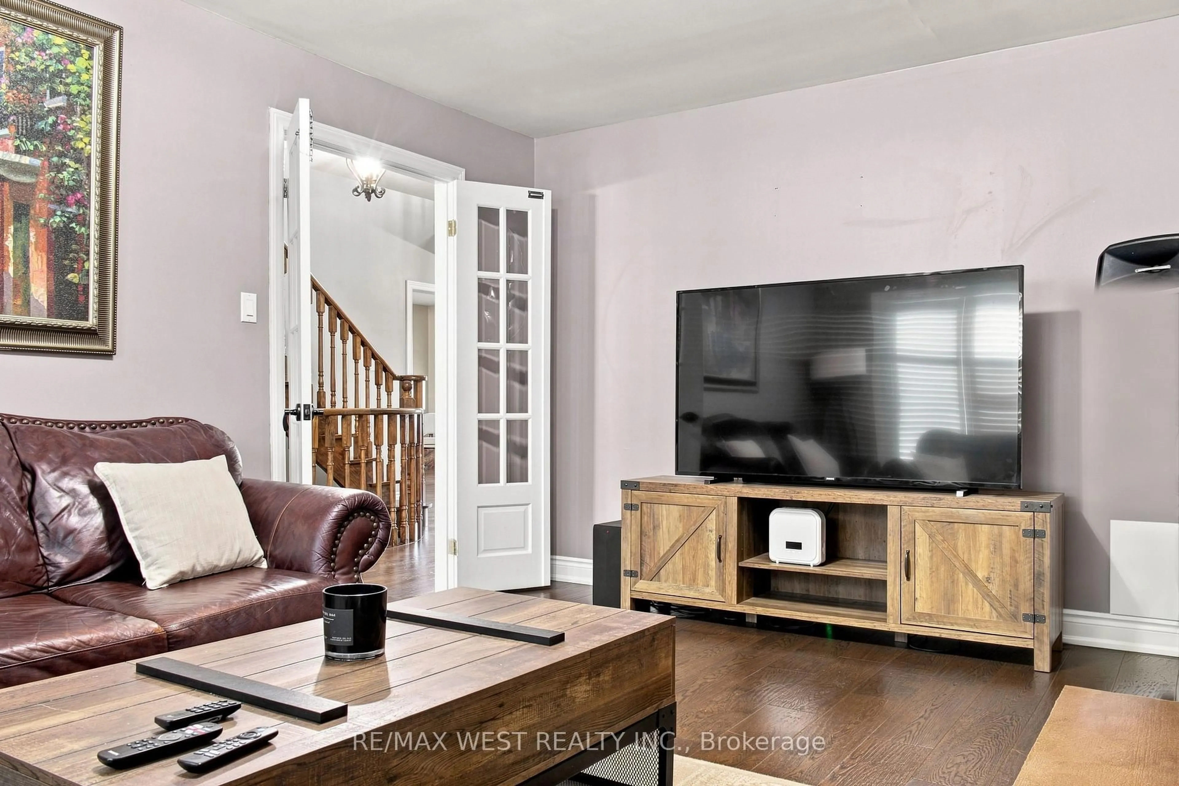Living room with furniture, wood/laminate floor for 414 Belview Ave, Vaughan Ontario L4L 7T5