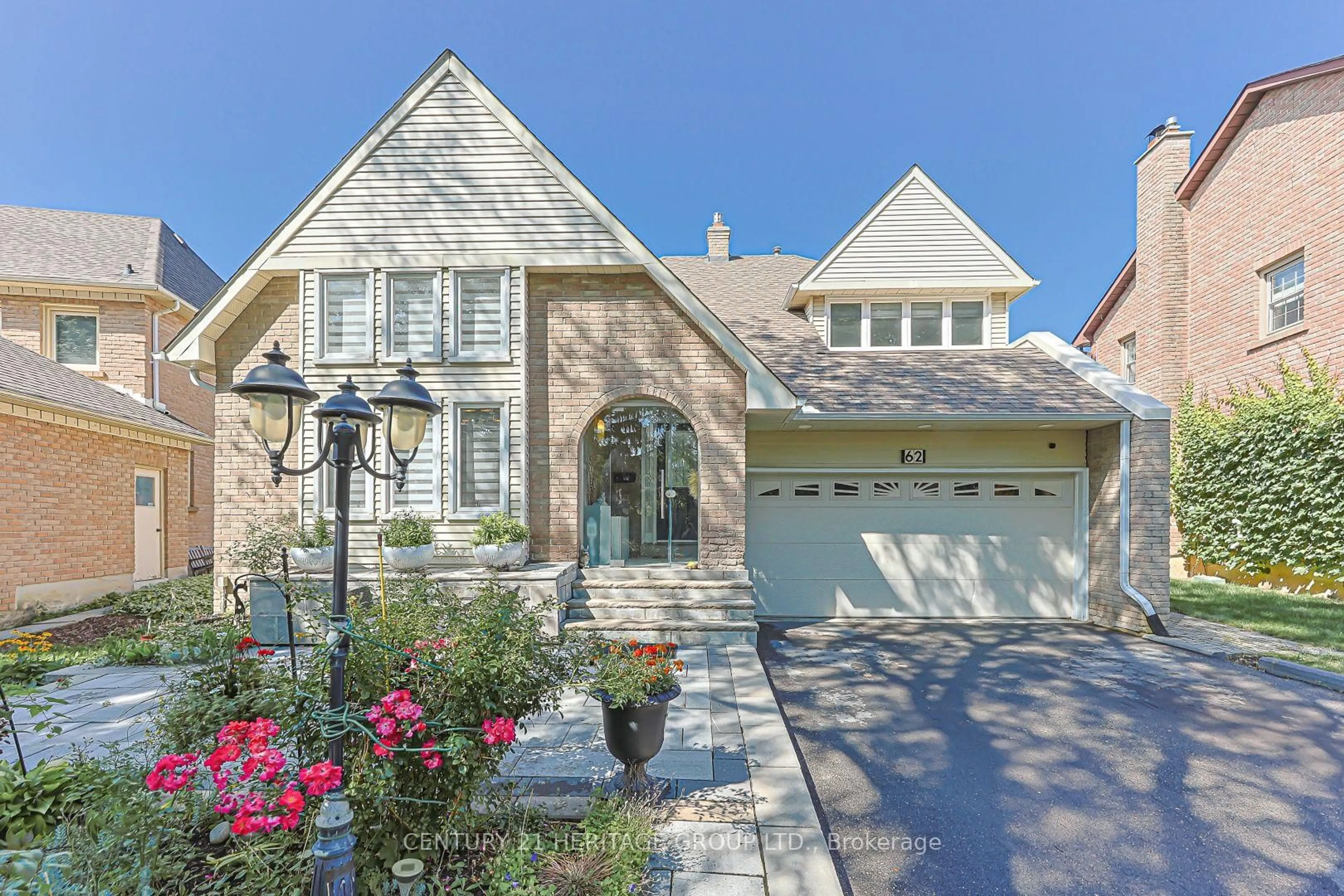 Home with brick exterior material, street for 62 Greencroft Cres, Markham Ontario L3R 3Y5