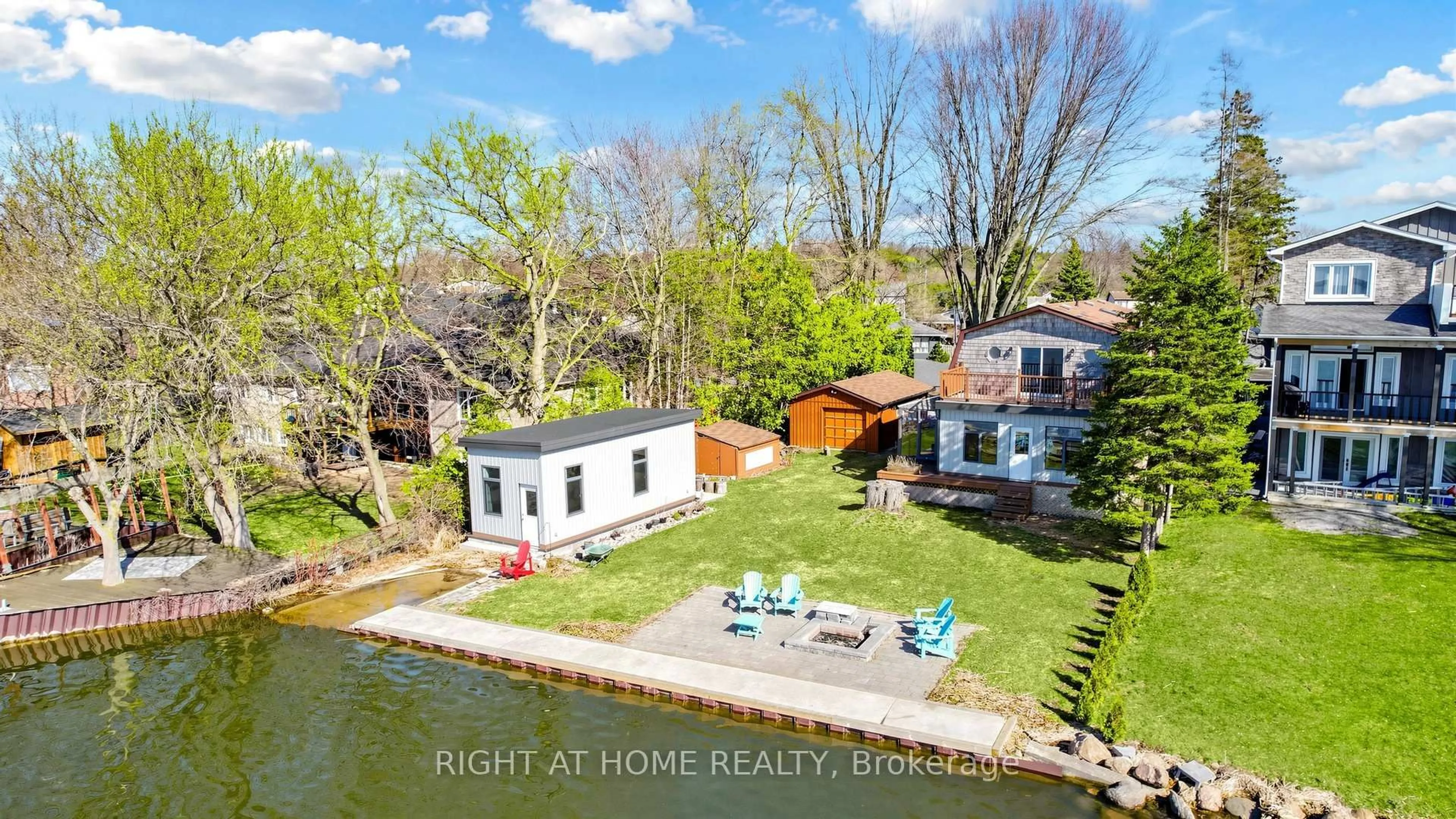A pic from outside/outdoor area/front of a property/back of a property/a pic from drone, water/lake/river/ocean view for 36 Shirlea Blvd, Georgina Ontario L4P 1K9