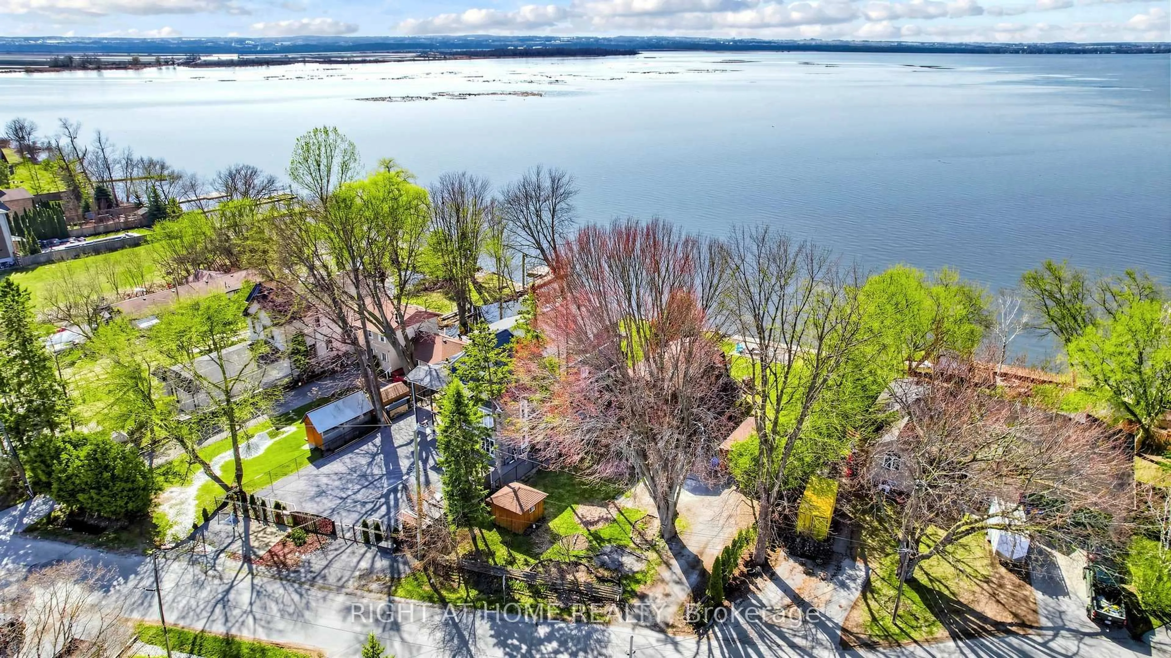 A pic from outside/outdoor area/front of a property/back of a property/a pic from drone, water/lake/river/ocean view for 36 Shirlea Blvd, Georgina Ontario L4P 1K9