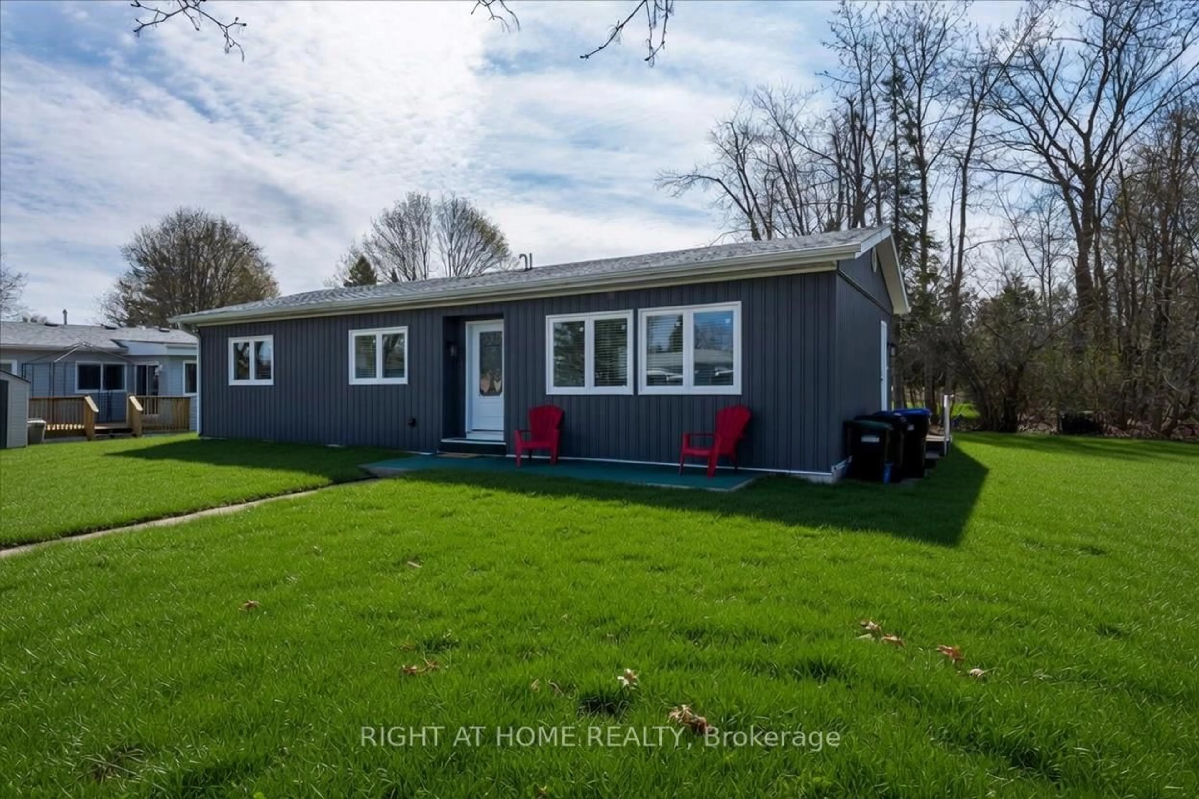 A pic from outside/outdoor area/front of a property/back of a property/a pic from drone, street for 1 South Blvd, Innisfil Ontario L9S 1L7