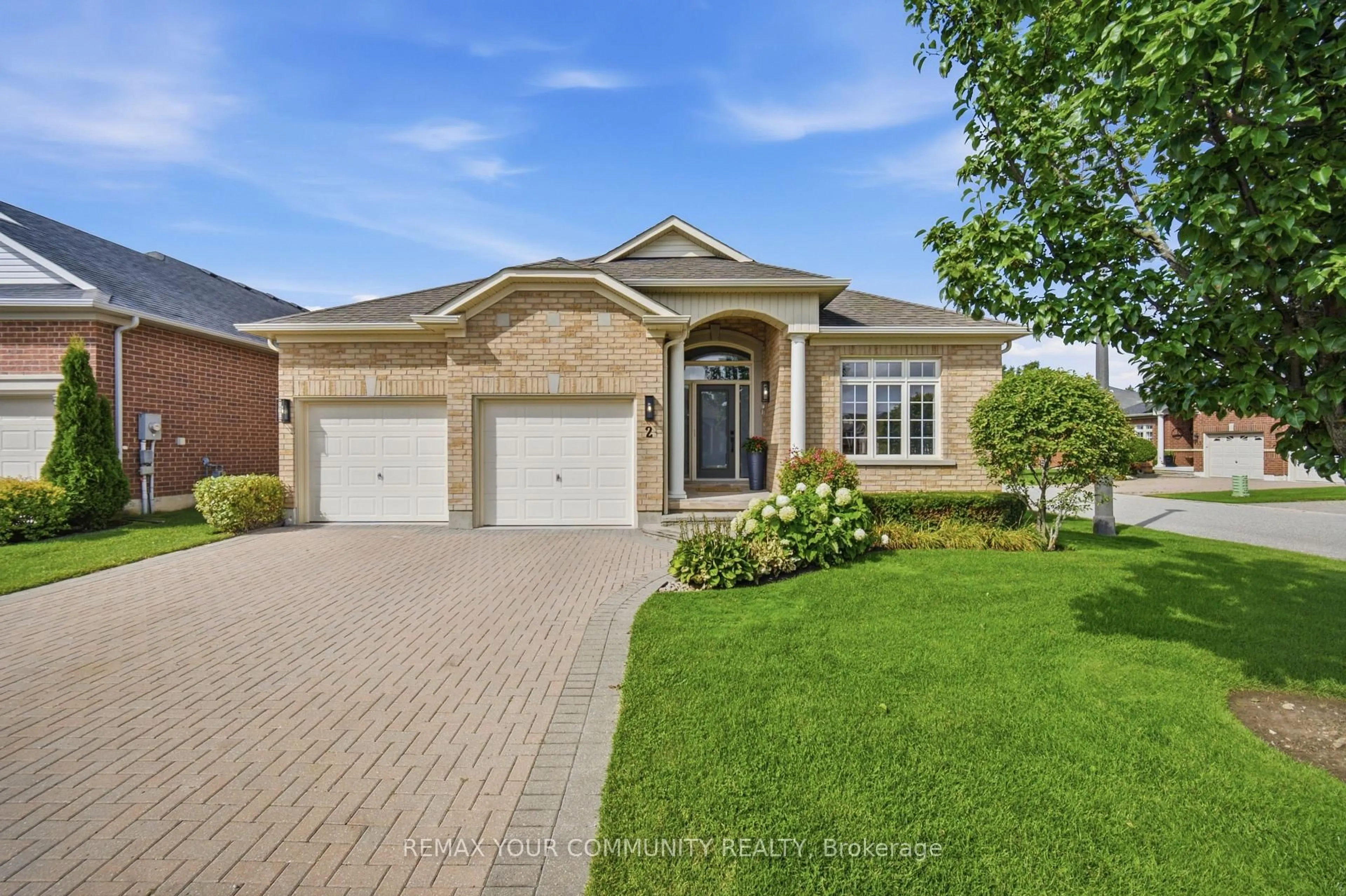 Home with brick exterior material, street for 2 Suggs Lane, Whitchurch-Stouffville Ontario L4A 0K6