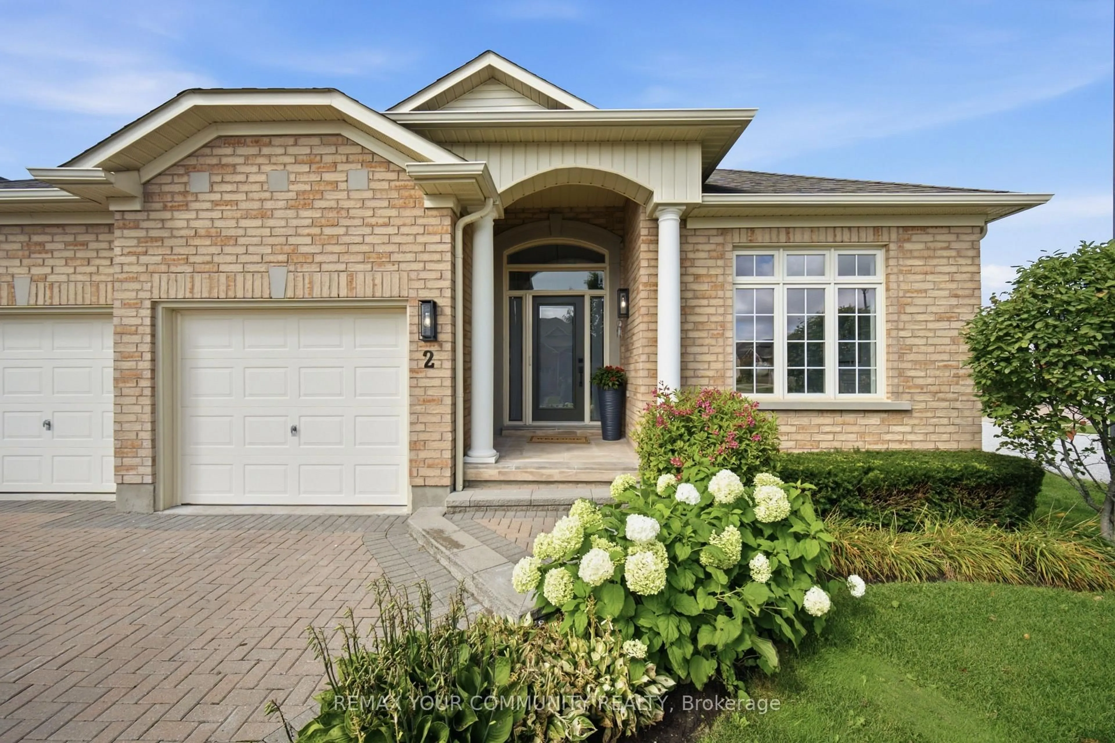 Home with brick exterior material, street for 2 Suggs Lane, Whitchurch-Stouffville Ontario L4A 0K6