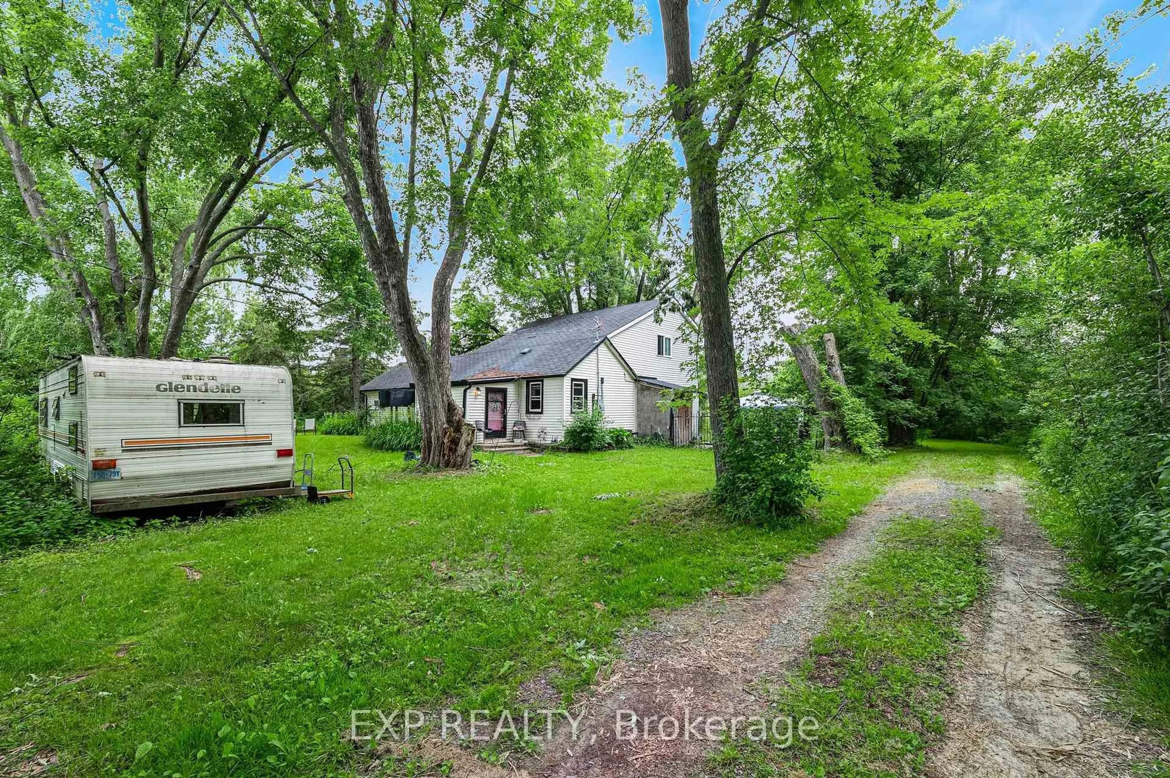 A pic from outside/outdoor area/front of a property/back of a property/a pic from drone, street for 1435 Thorah Concession Road 7, Brock Ontario L0K 1A0