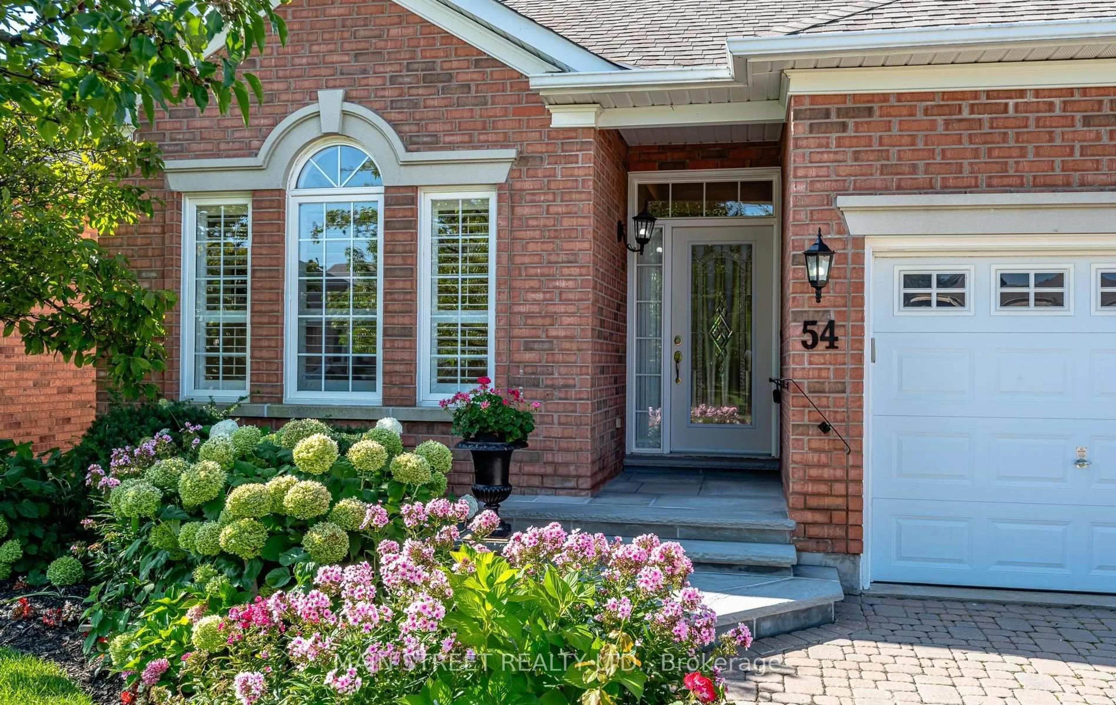 Home with brick exterior material, street for 54 Couples Gallery, Whitchurch-Stouffville Ontario L4A 1M6
