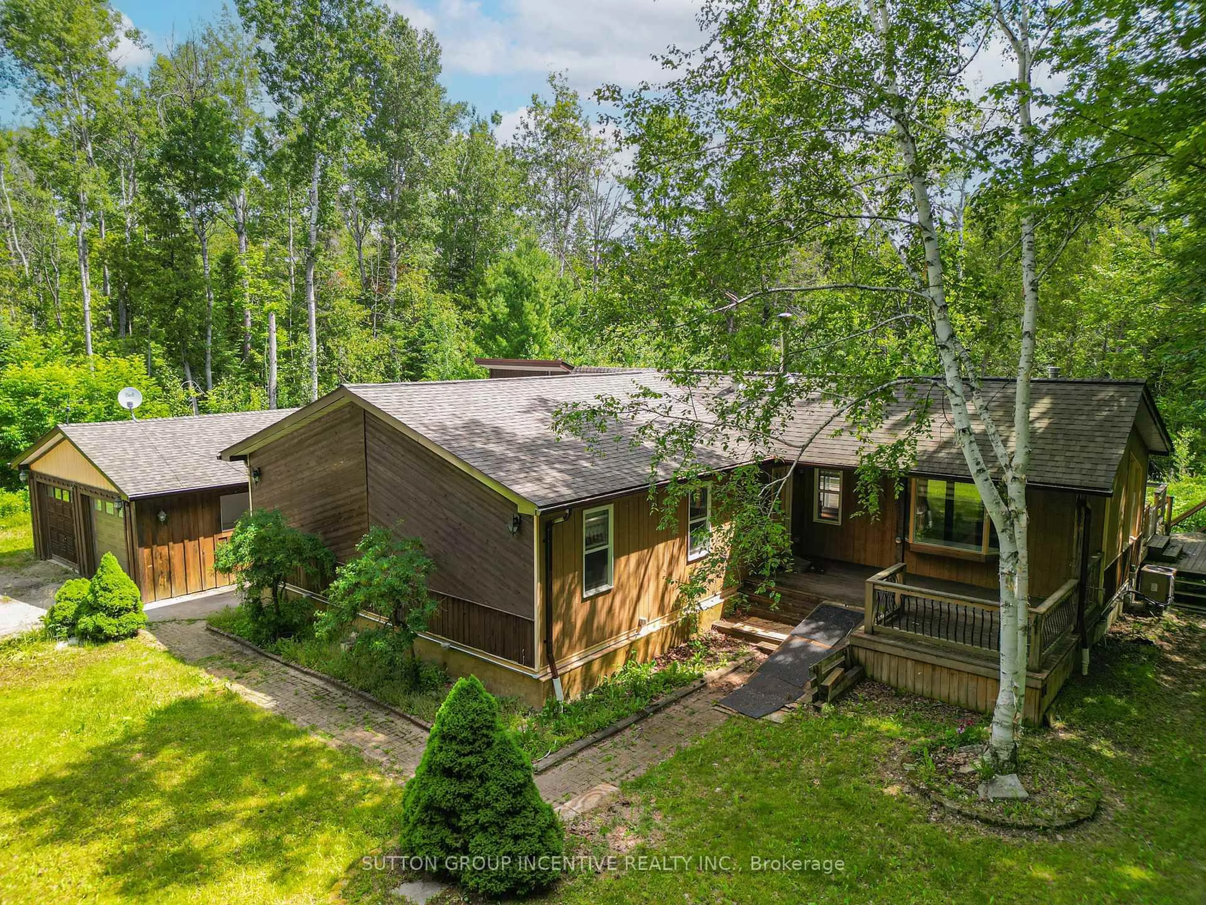 A pic from outside/outdoor area/front of a property/back of a property/a pic from drone, forest/trees view for 59 Forest Hill Dr, Adjala-Tosorontio Ontario L0M 1J0
