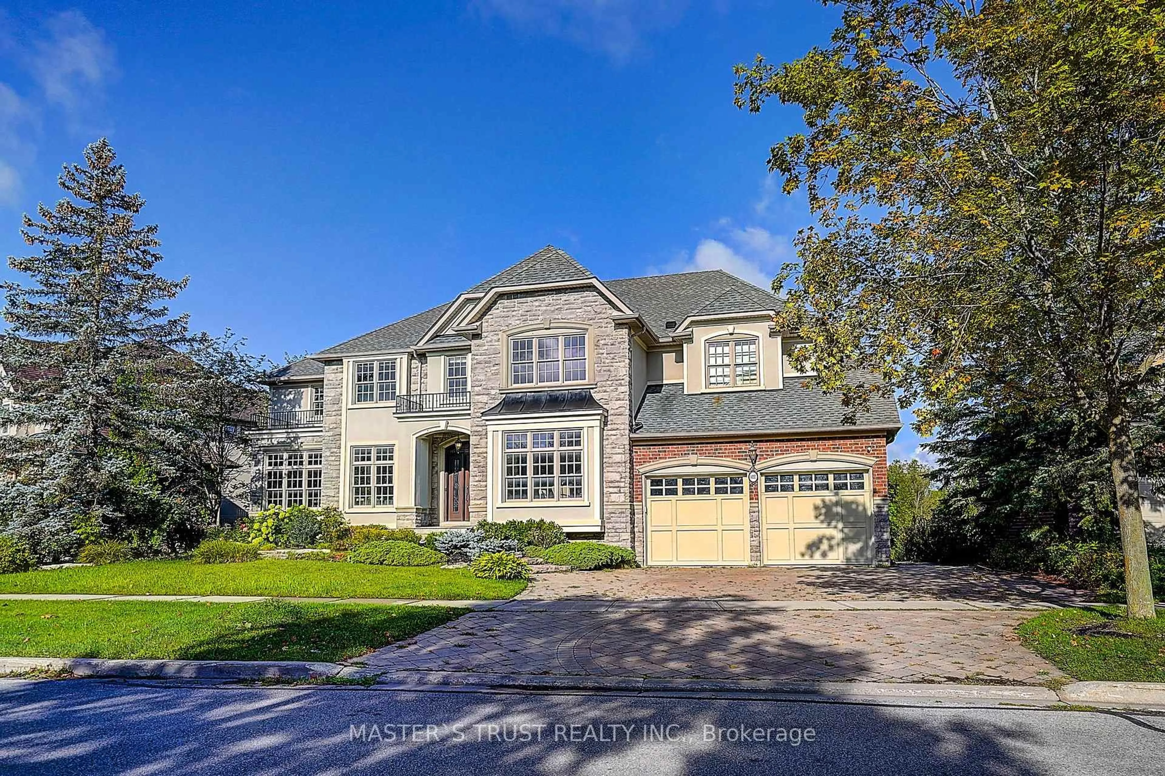 Home with brick exterior material, street for 122 Angus Glen Blvd, Markham Ontario L6C 3B8