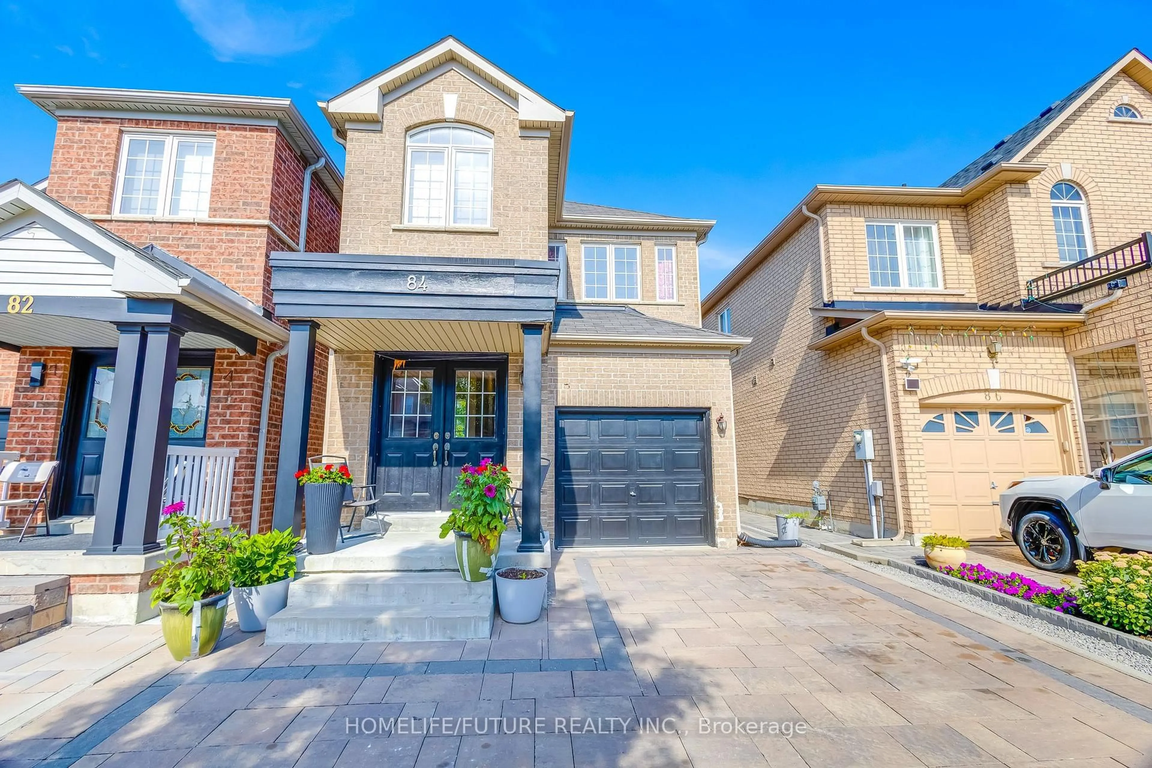 Home with brick exterior material, street for 84 Jack Monkman Cres, Markham Ontario L3S 0A4