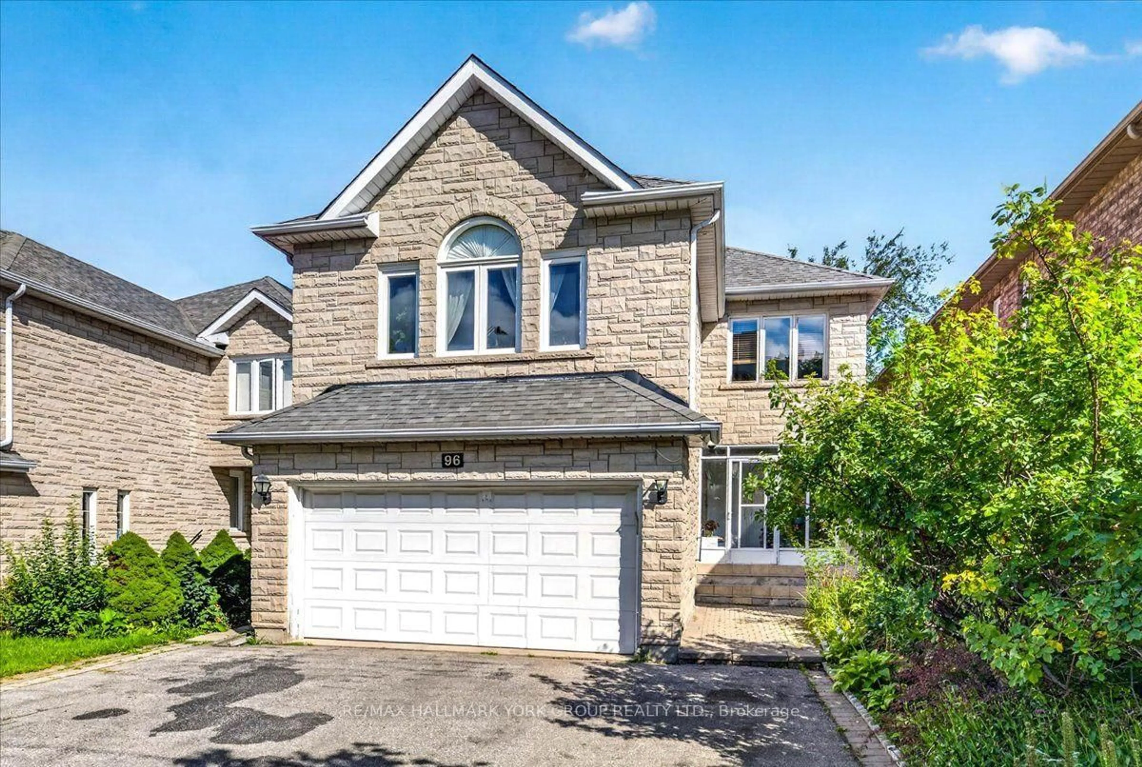 Home with brick exterior material, street for 96 Townsgate Dr, Vaughan Ontario L4J 8A4