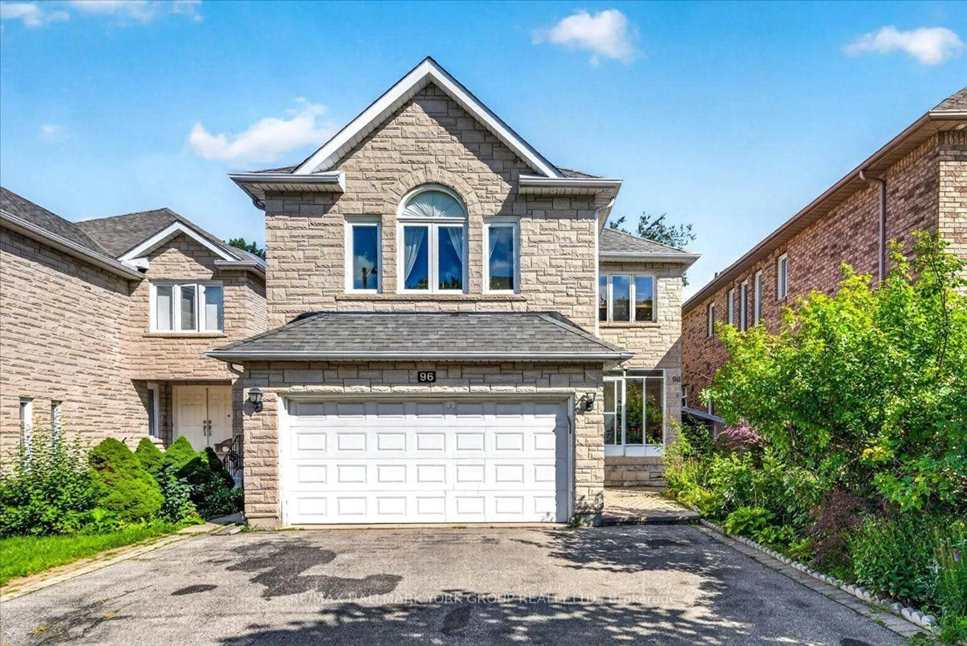 Home with brick exterior material, street for 96 Townsgate Dr, Vaughan Ontario L4J 8A4