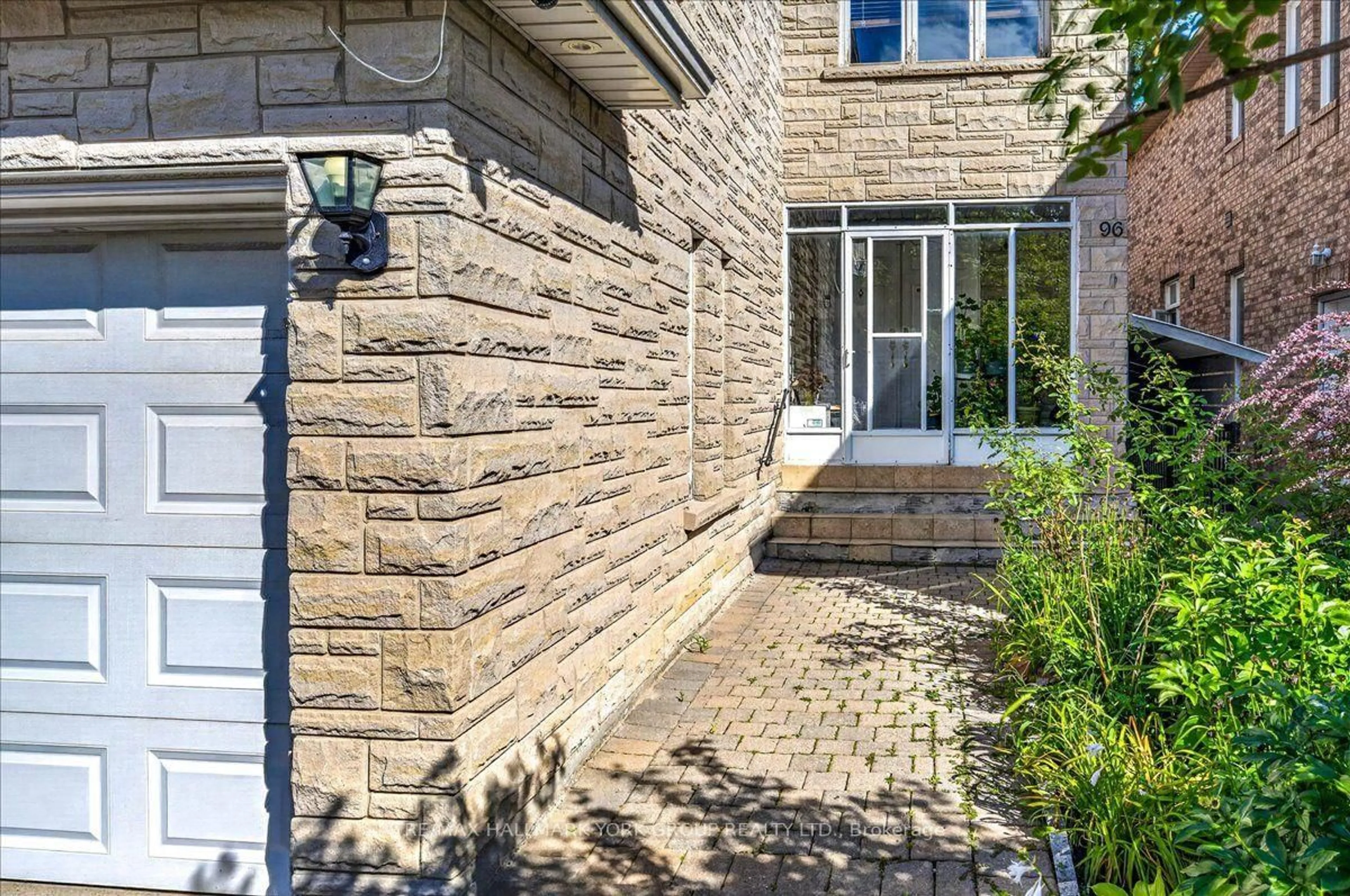 Home with brick exterior material, street for 96 Townsgate Dr, Vaughan Ontario L4J 8A4