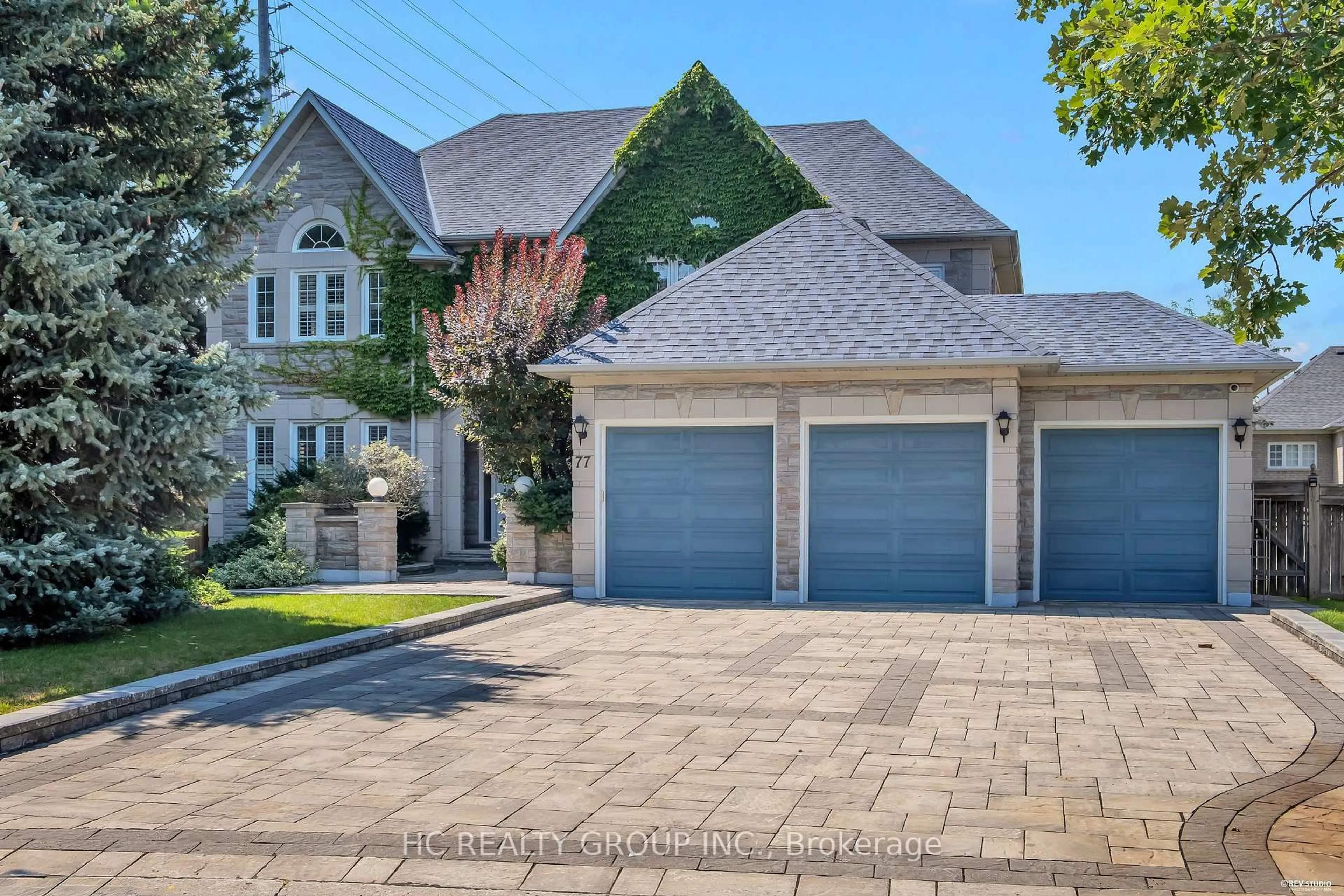 Home with brick exterior material, street for 77 Sutcliffe Cres, Markham Ontario L6C 1X2