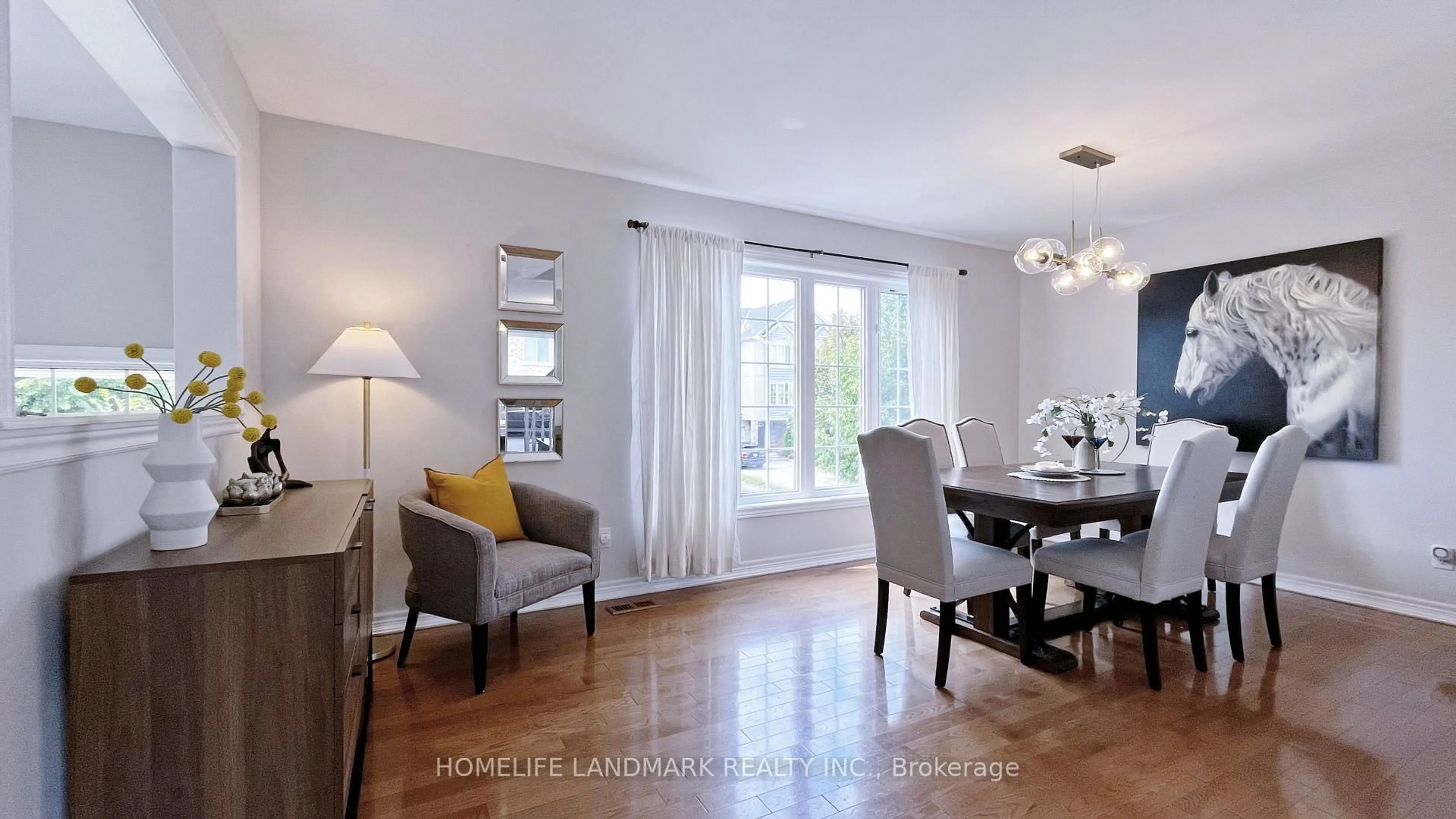 Living room with furniture, wood/laminate floor for 165 Gail Parks Cres, Newmarket Ontario L3X 3C1