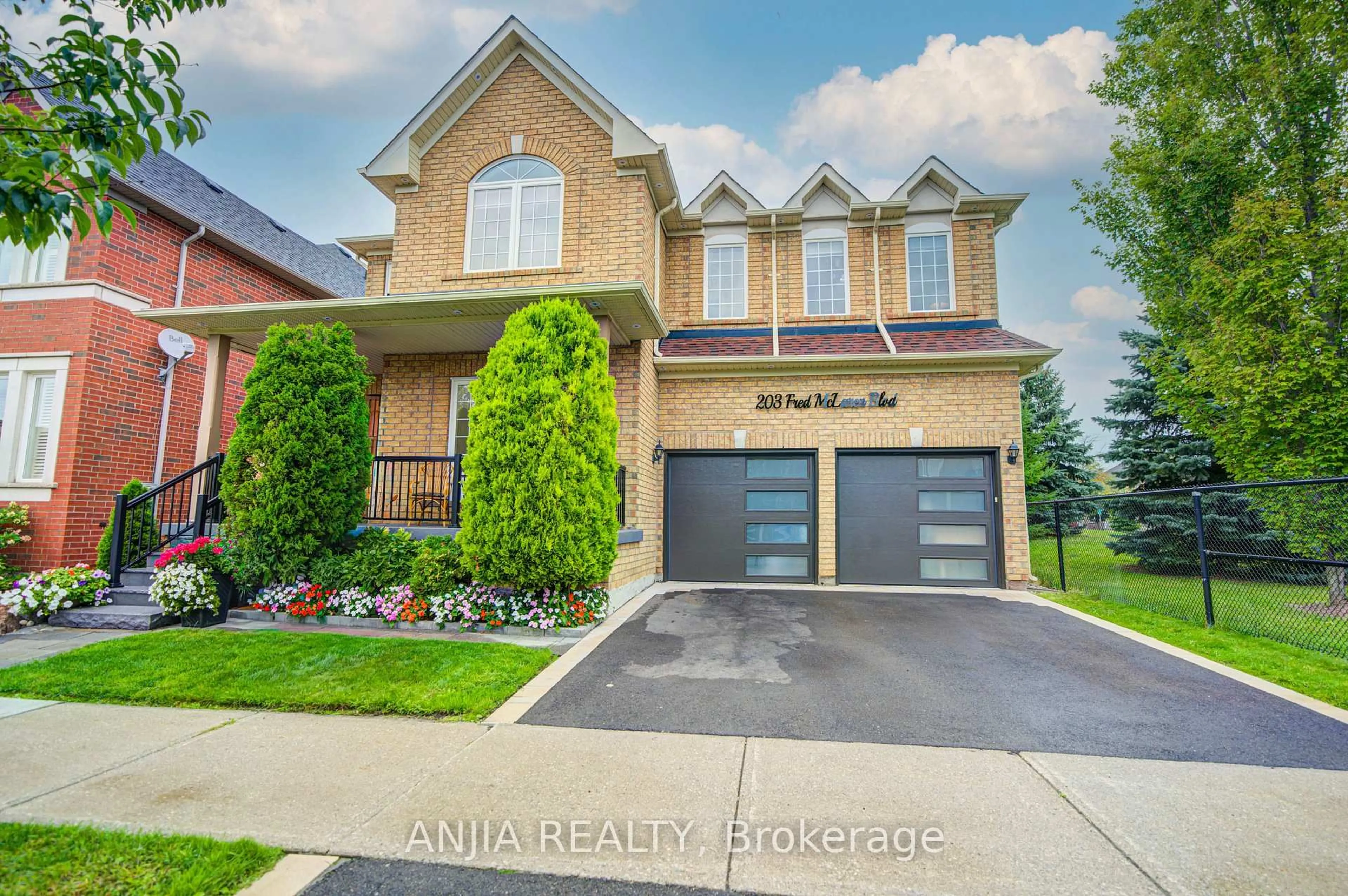 Home with brick exterior material, street for 203 Fred Mclaren Blvd, Markham Ontario L6E 1H2