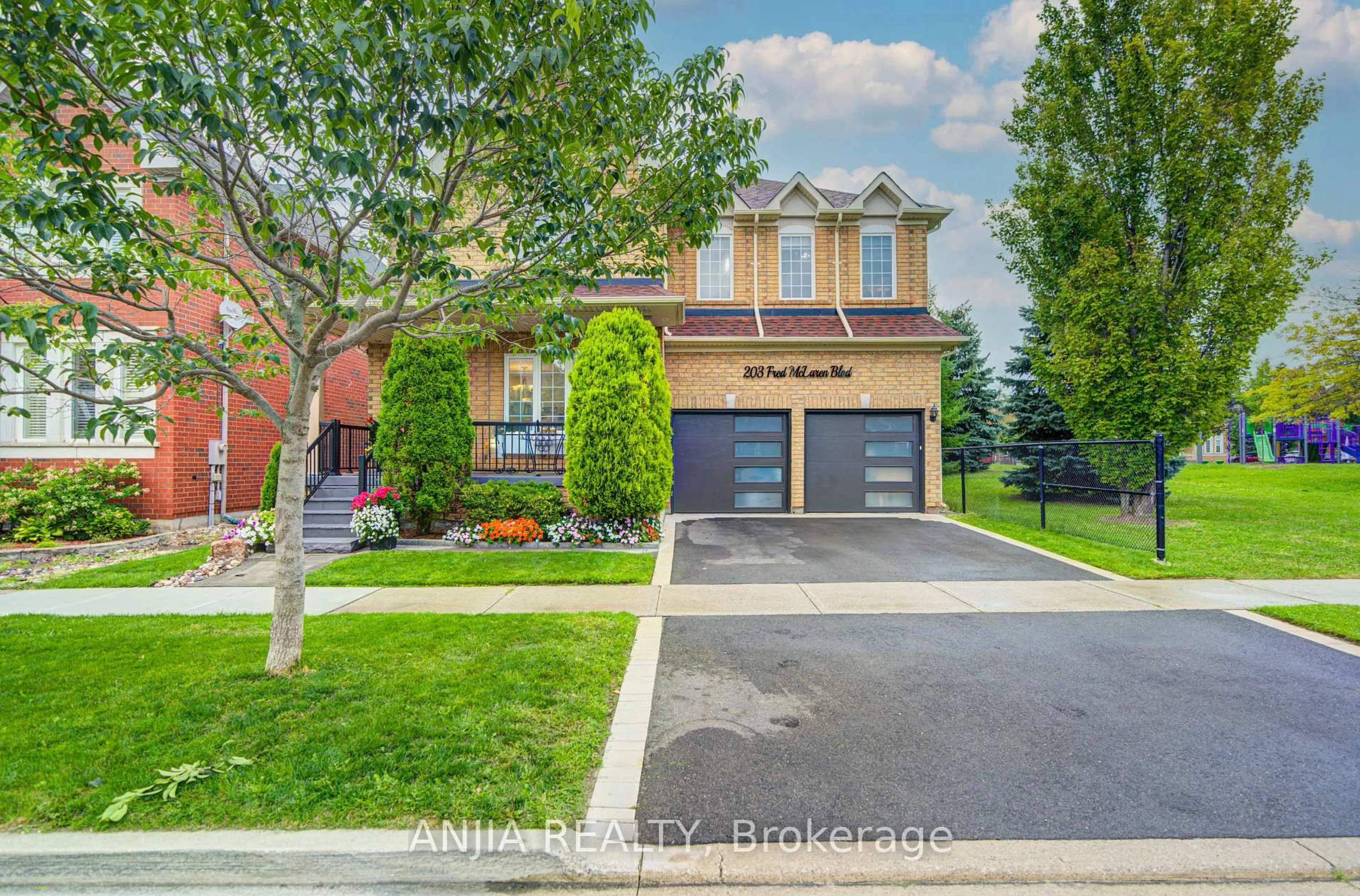 Home with brick exterior material, street for 203 Fred Mclaren Blvd, Markham Ontario L6E 1H2