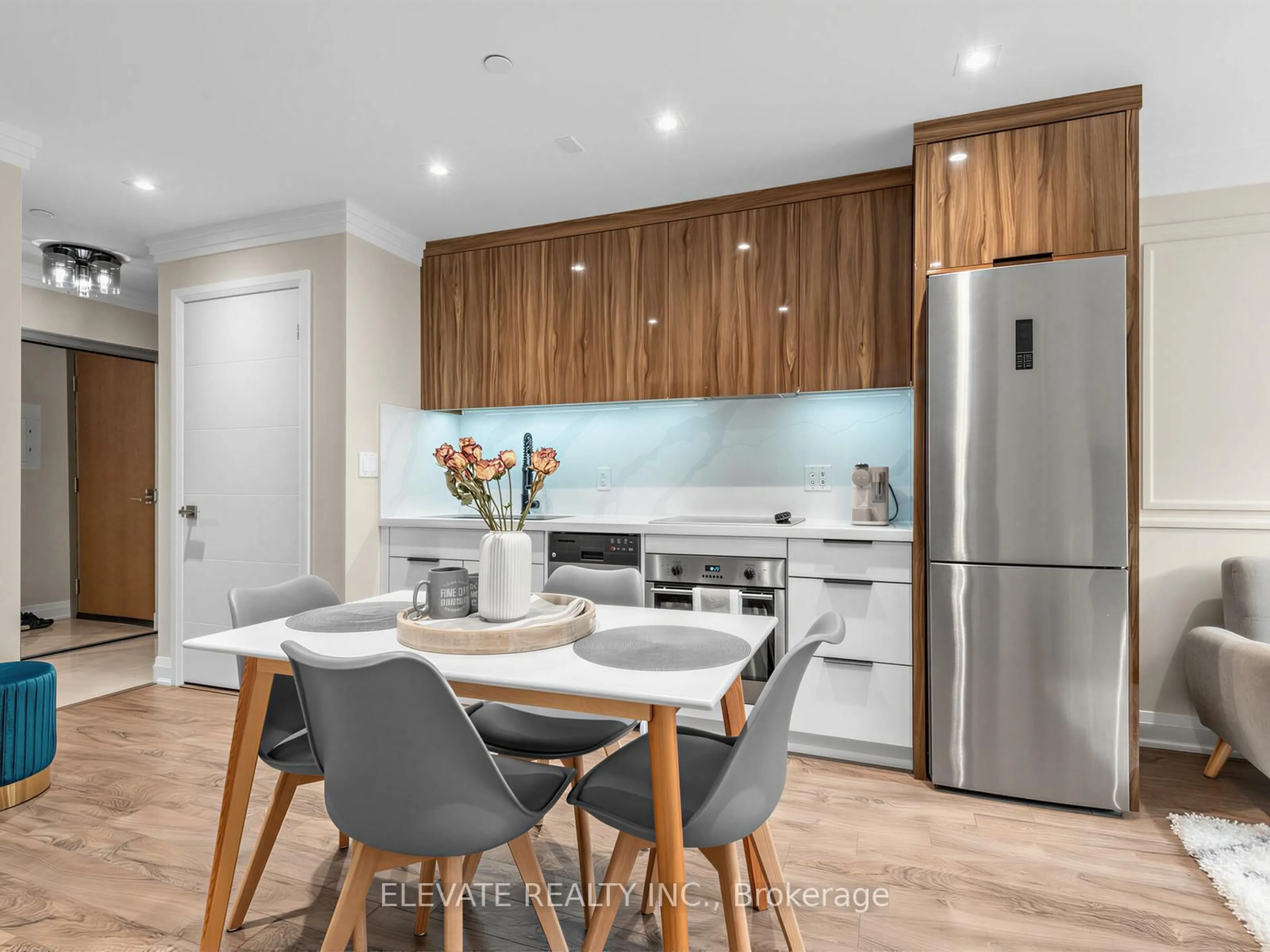 Open concept kitchen, wood/laminate floor for 18 Uptown Dr #229, Markham Ontario L3R 5M5