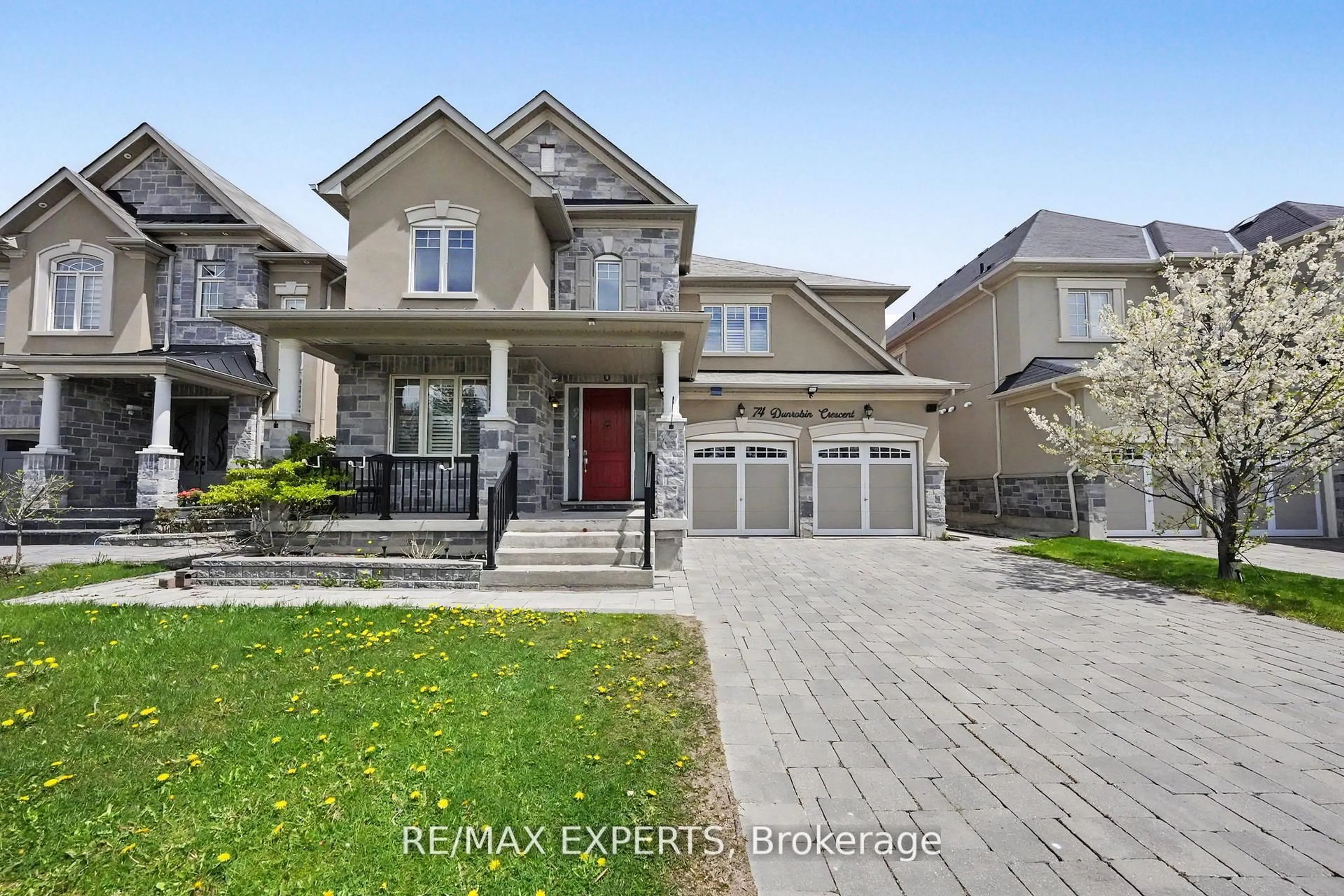Home with brick exterior material, street for 74 Dunrobin Cres, Vaughan Ontario L4H 4A9