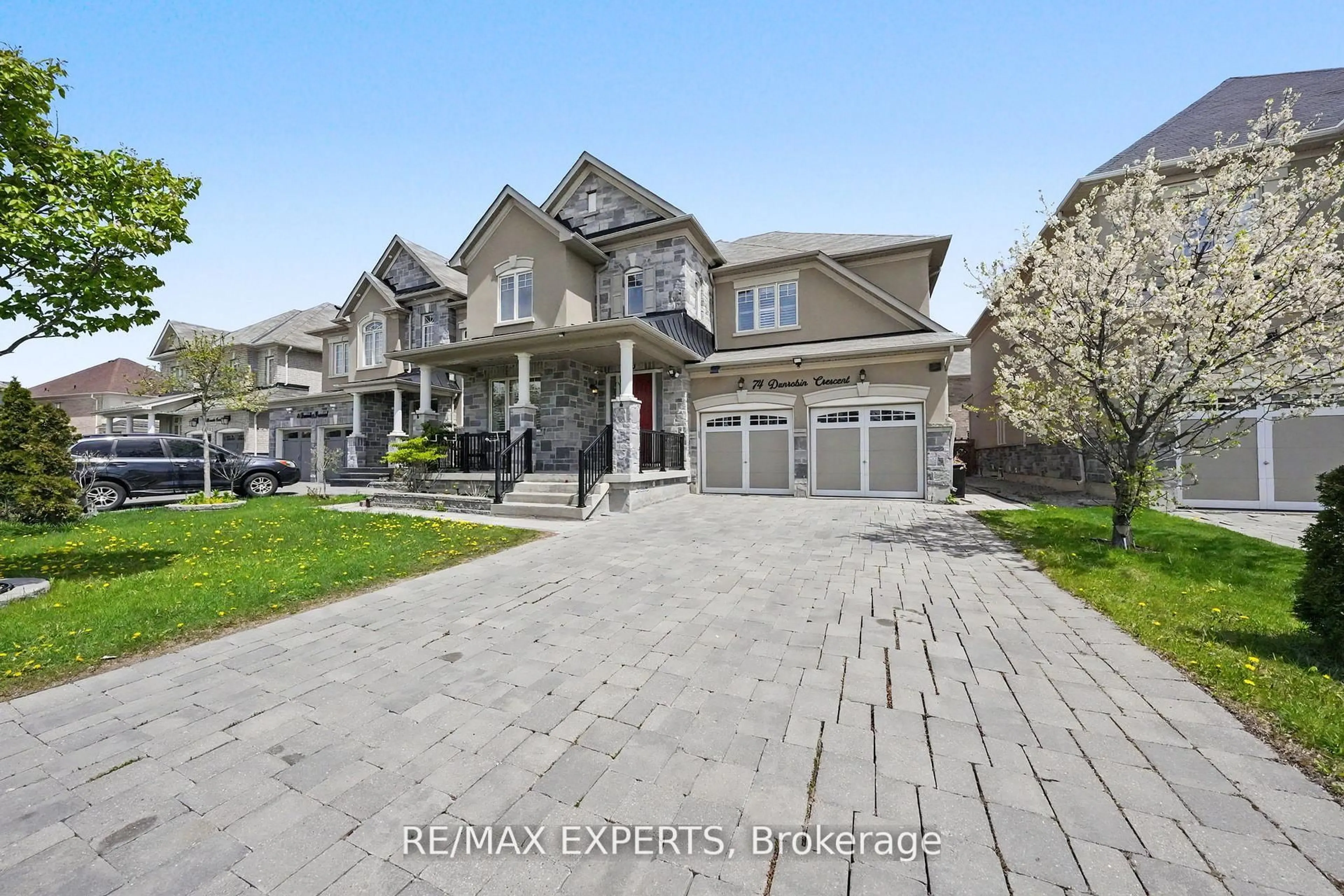 Home with brick exterior material, street for 74 Dunrobin Cres, Vaughan Ontario L4H 4A9