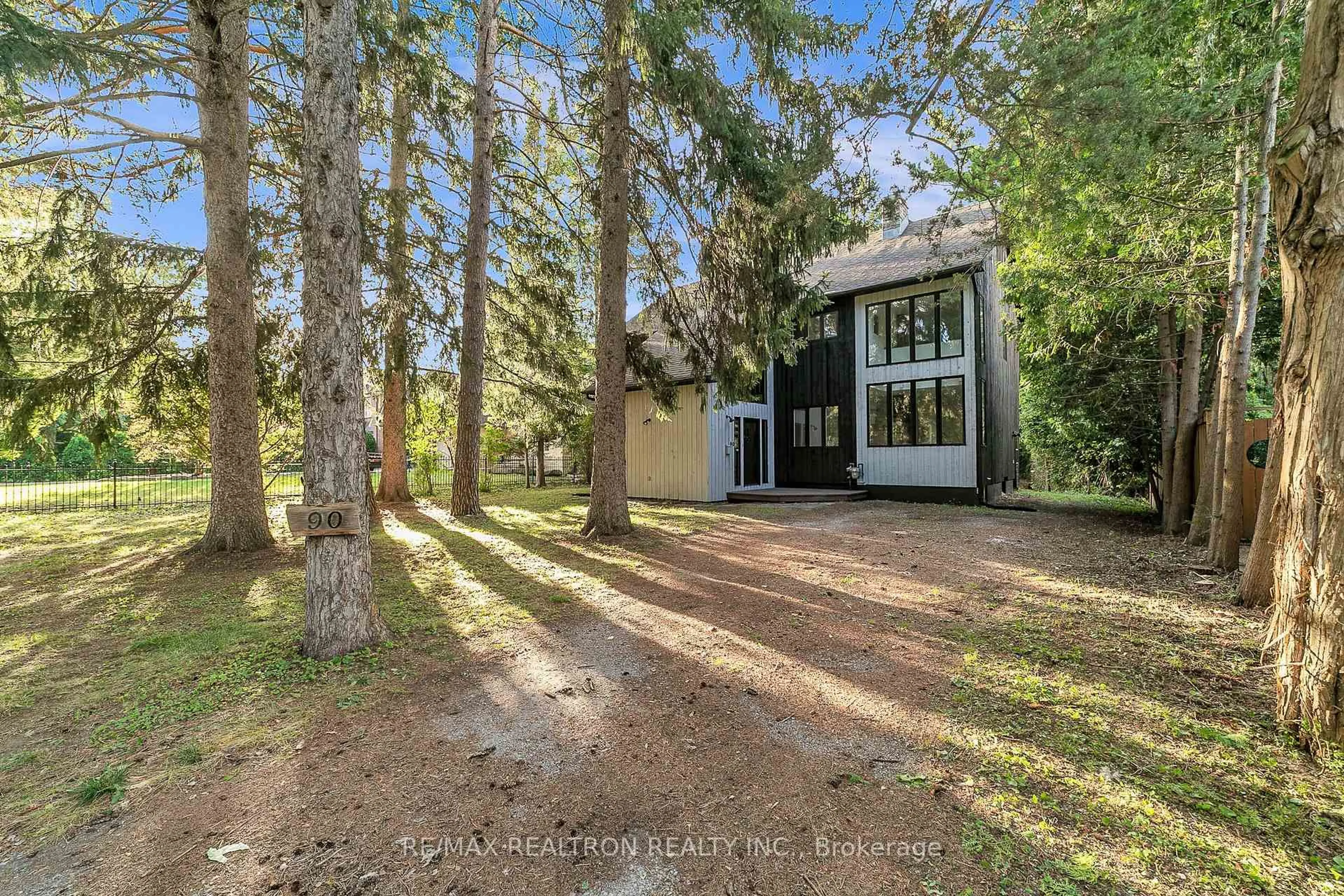A pic from outside/outdoor area/front of a property/back of a property/a pic from drone, forest/trees view for 90 Proctor Ave, Markham Ontario L3T 1M7