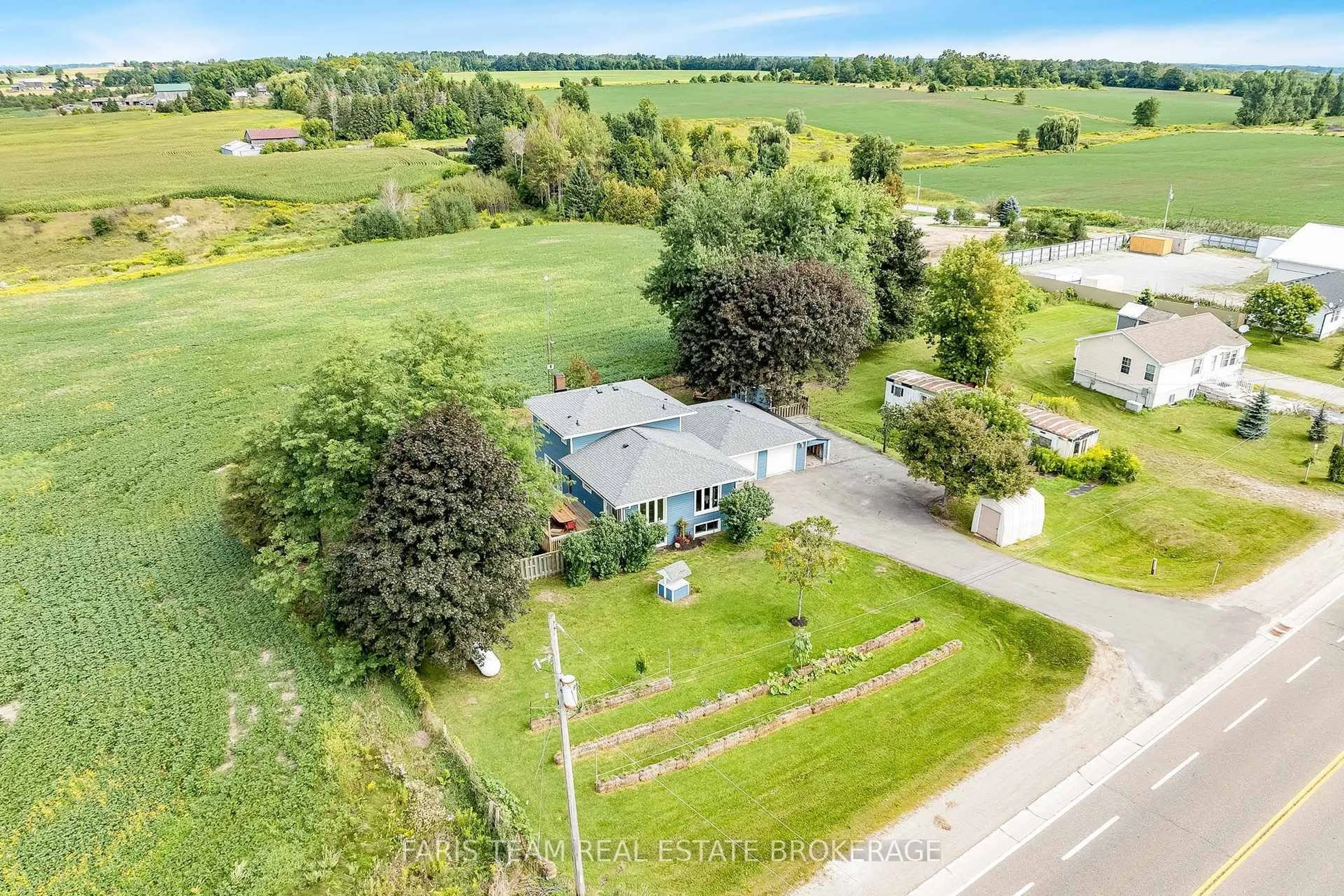 A pic from outside/outdoor area/front of a property/back of a property/a pic from drone, unknown for 5390 Highway 89, Essa Ontario L0L 1L0