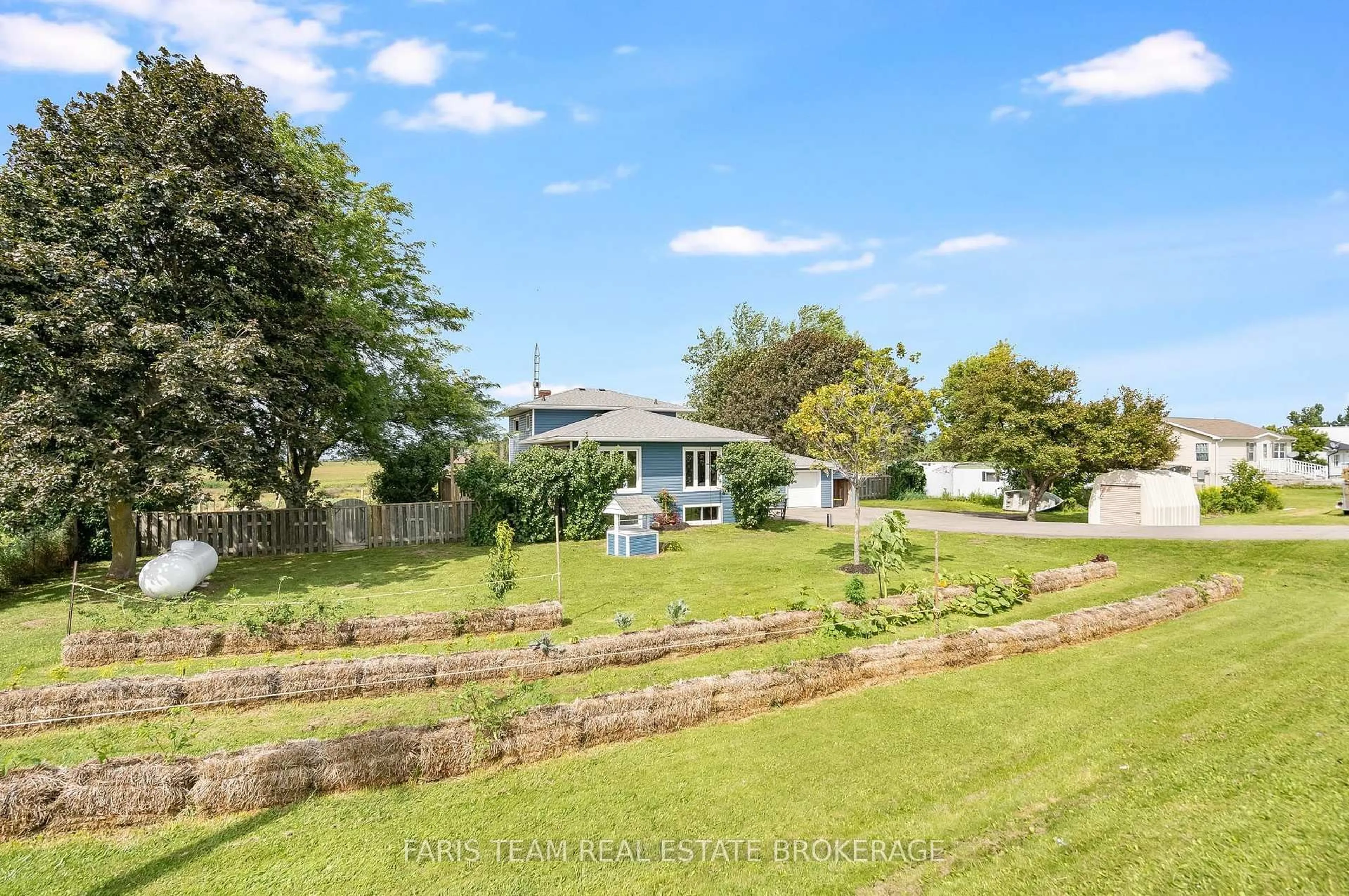 A pic from outside/outdoor area/front of a property/back of a property/a pic from drone, water/lake/river/ocean view for 5390 Highway 89, Essa Ontario L0L 1L0