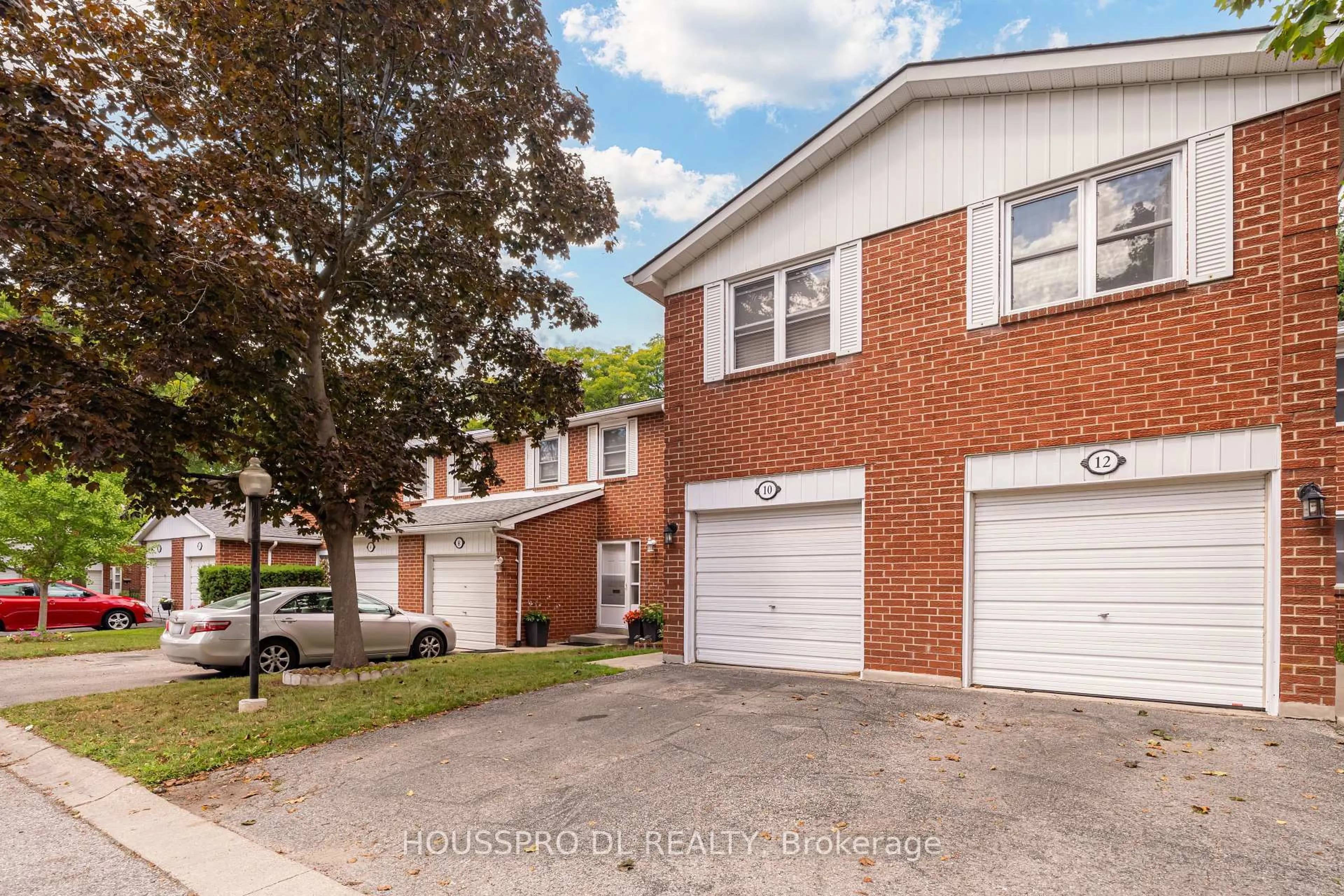 Home with brick exterior material, street for 10 Bowman Way #145, Markham Ontario L3T 4Z7