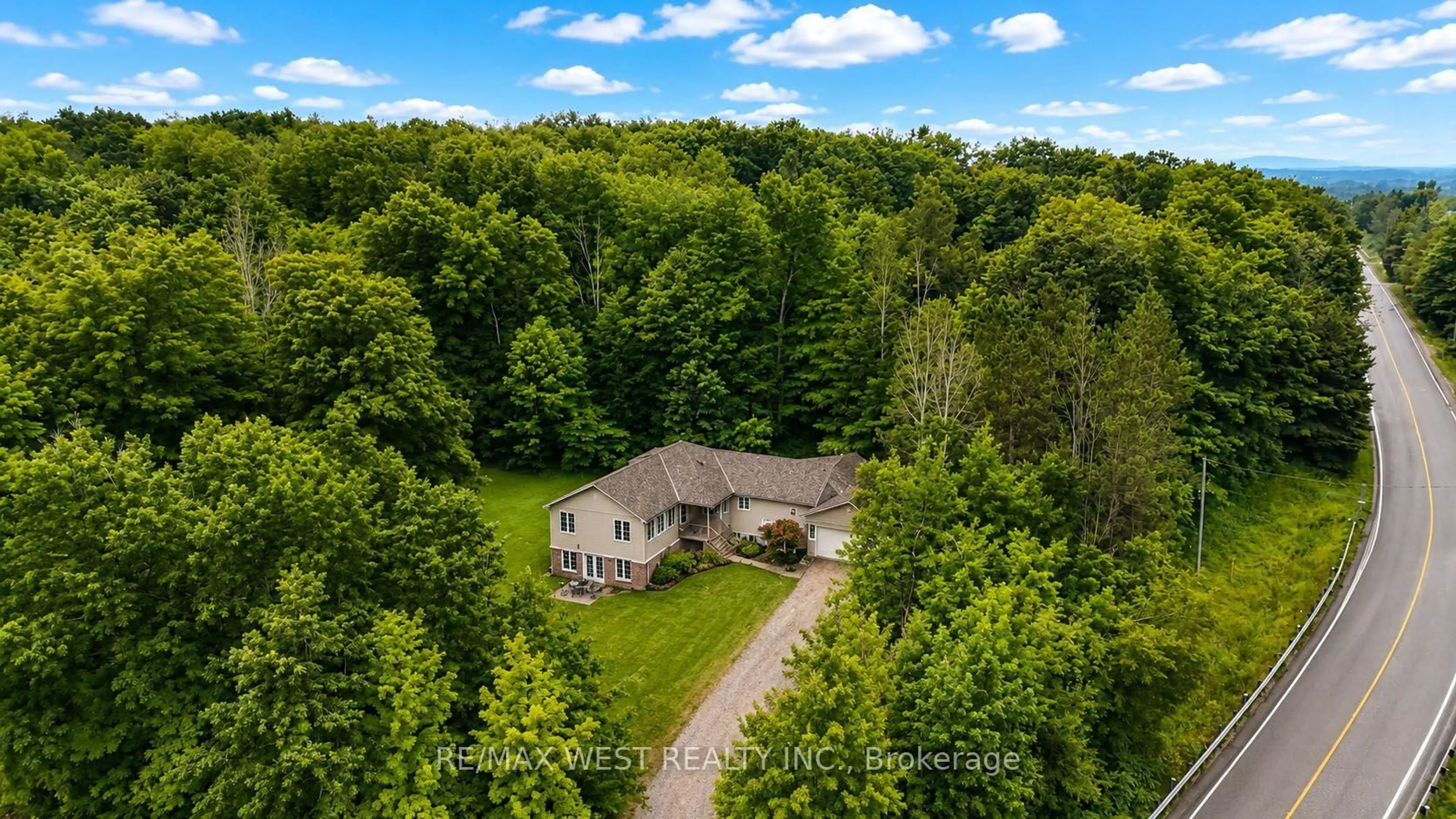 A pic from outside/outdoor area/front of a property/back of a property/a pic from drone, forest/trees view for 4927 25th Sdrd, Essa Ontario L0L 2N0