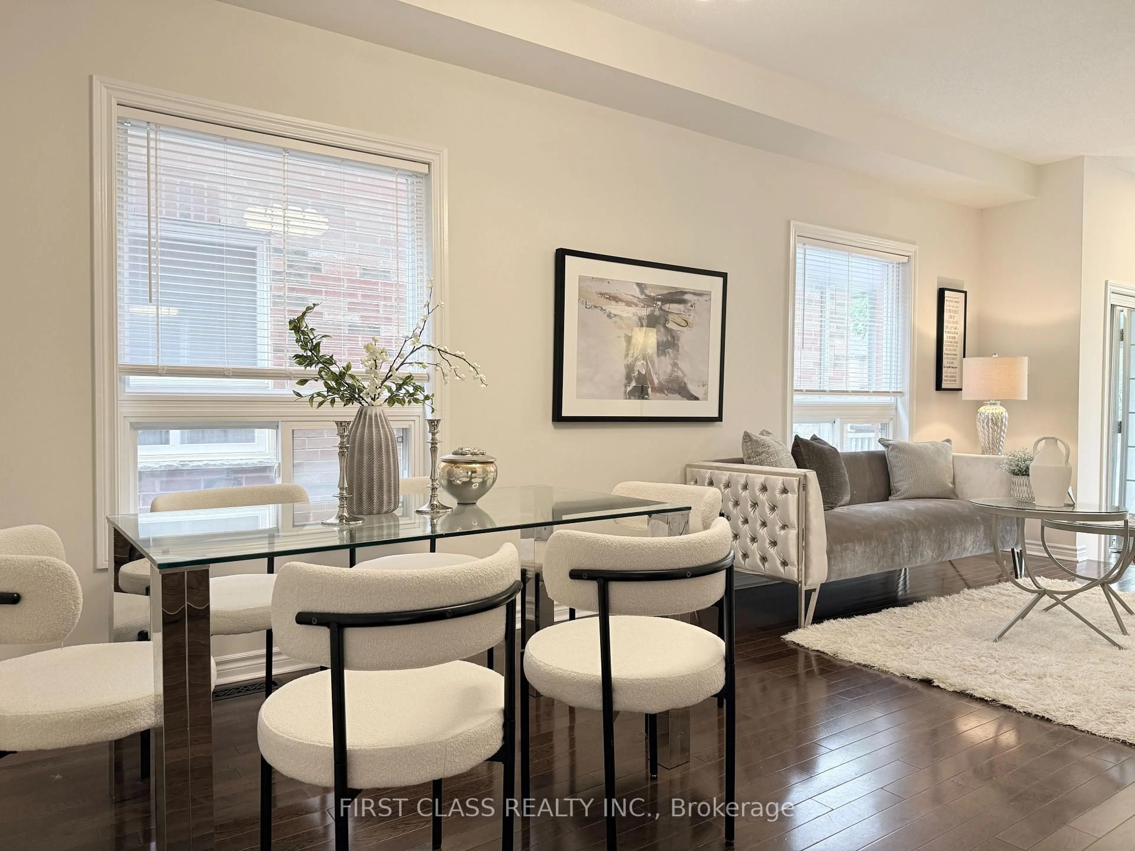 Living room with furniture, wood/laminate floor for 89 Castan Ave, Markham Ontario L3R 5R1