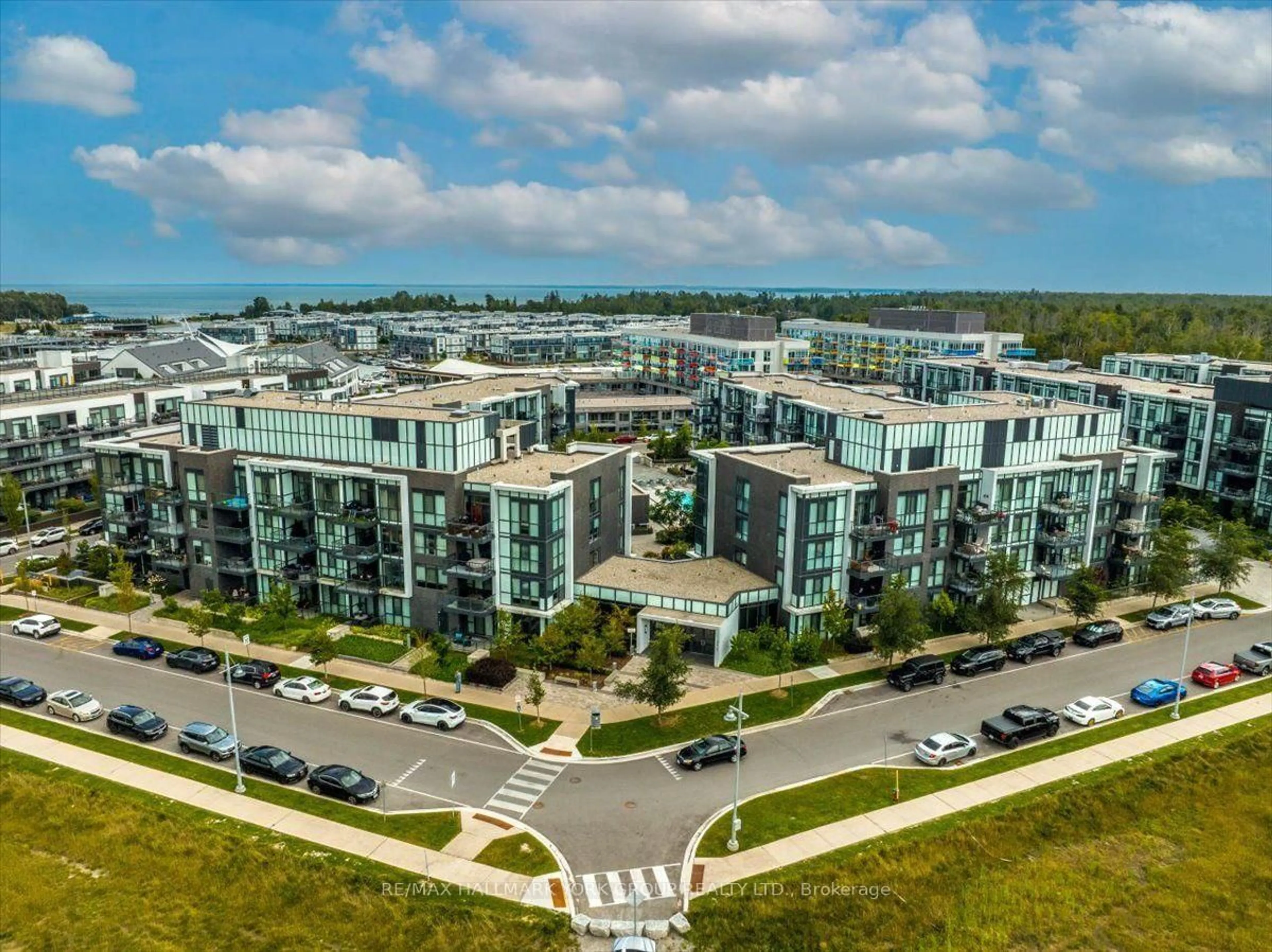 A pic from outside/outdoor area/front of a property/back of a property/a pic from drone, unknown for 375 Sea Ray Ave #410, Innisfil Ontario L9S 0N9