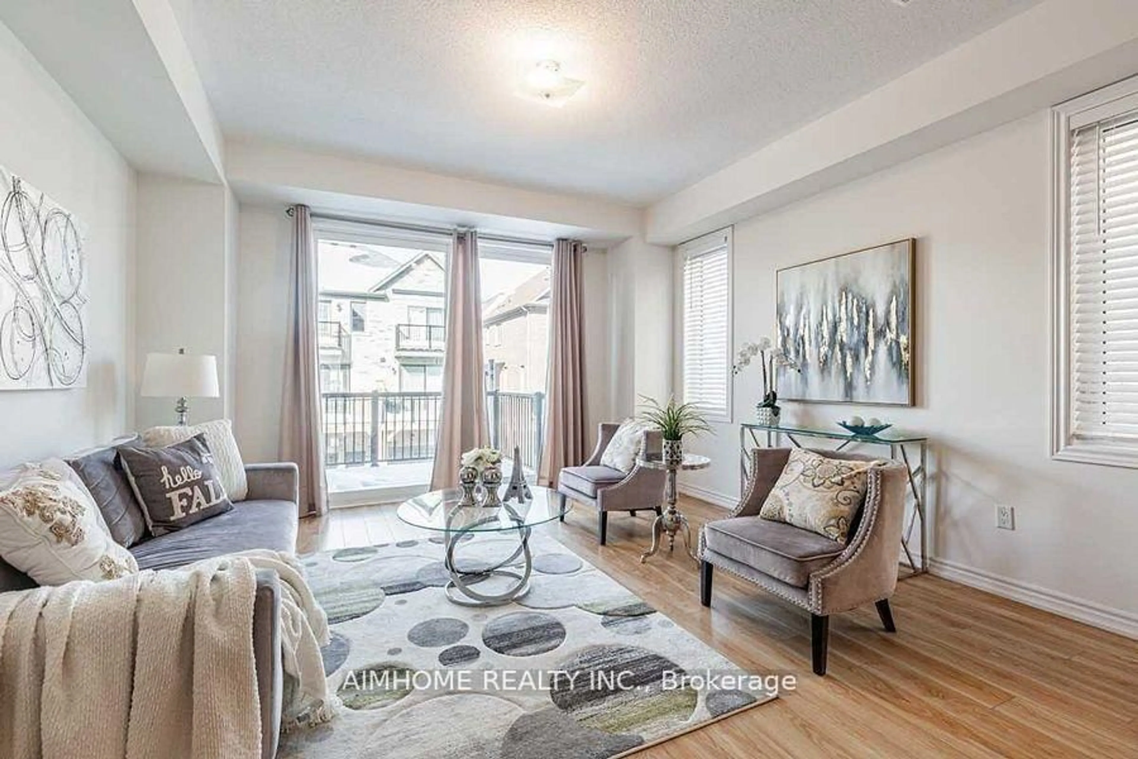 Living room with furniture, wood/laminate floor for 116 Frederick Wilson Ave, Markham Ontario L6B 1P7