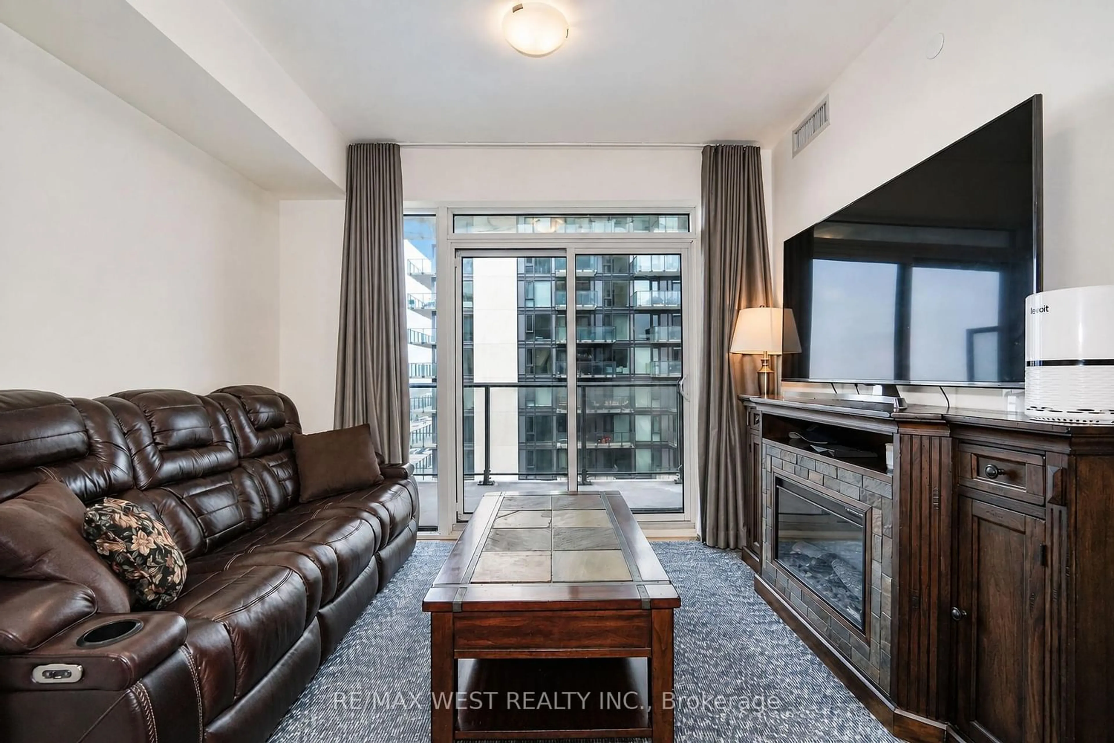 Living room with furniture, unknown for 8960 Jane St #1502, Vaughan Ontario L4K 0N9