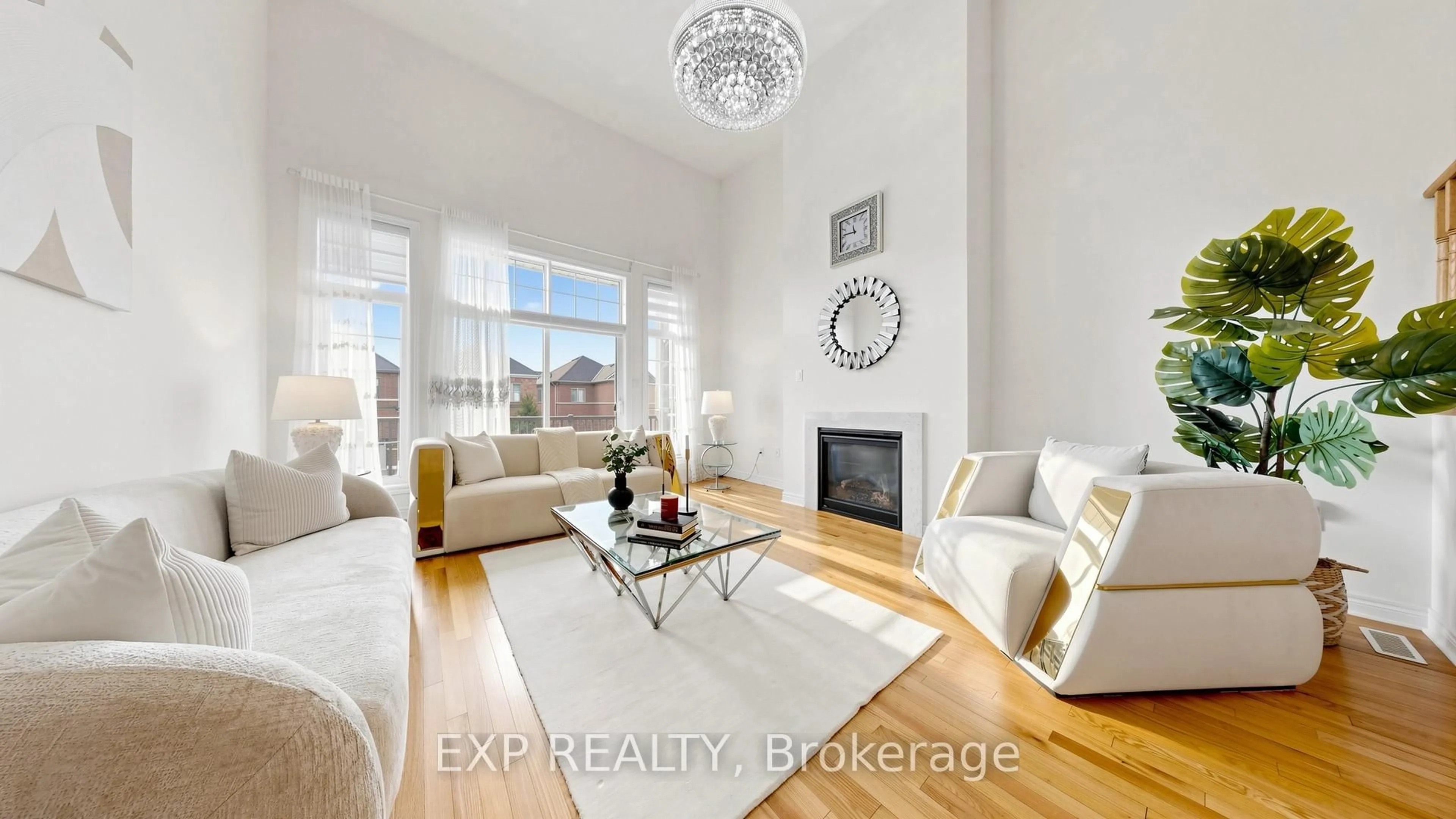 Living room with furniture, wood/laminate floor for 34 Buttonleaf Cres, Whitchurch-Stouffville Ontario L4A 4P5