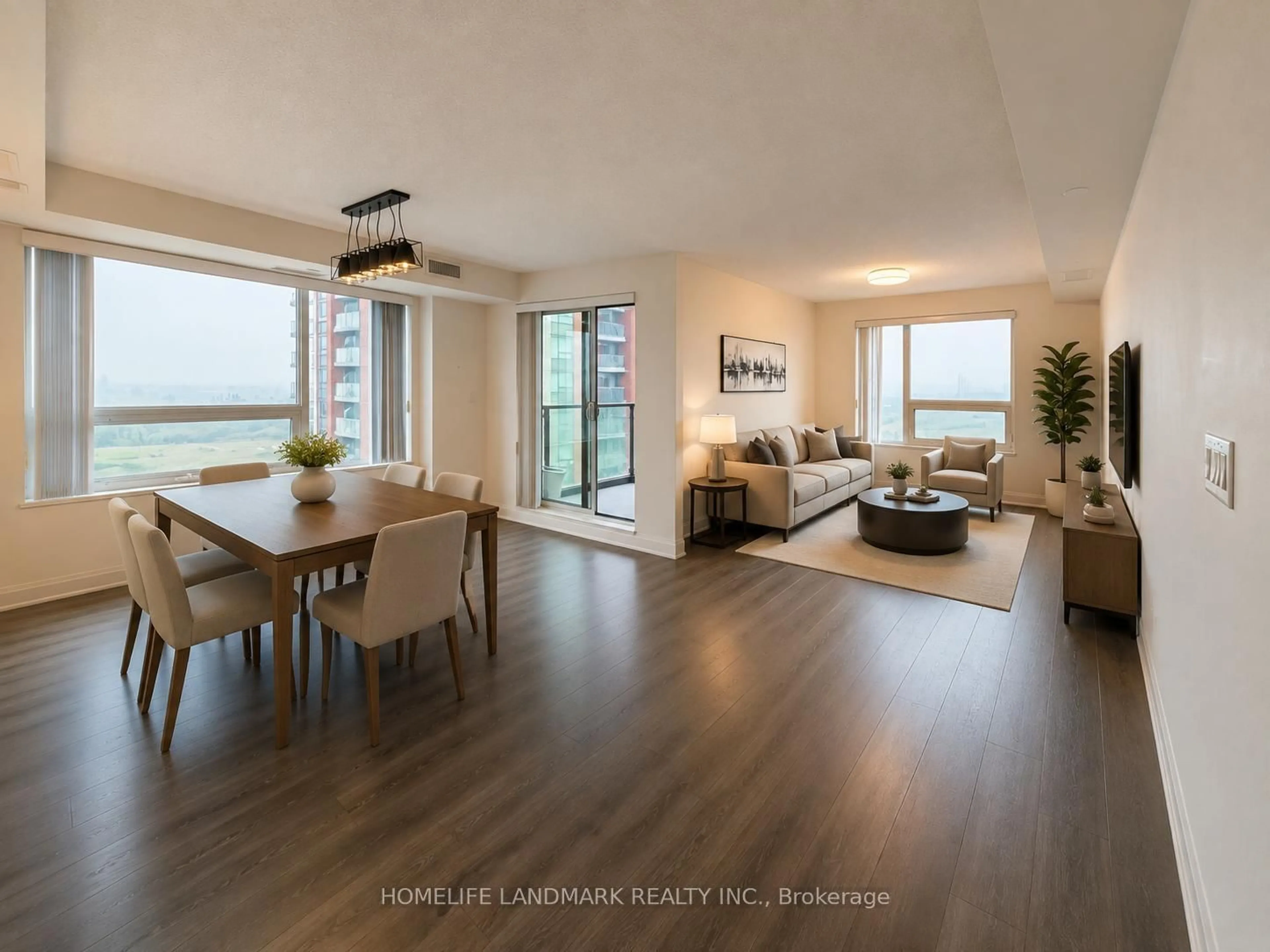 Living room with furniture, wood/laminate floor for 1 Uptown Dr #1702, Markham Ontario L3R 5C1
