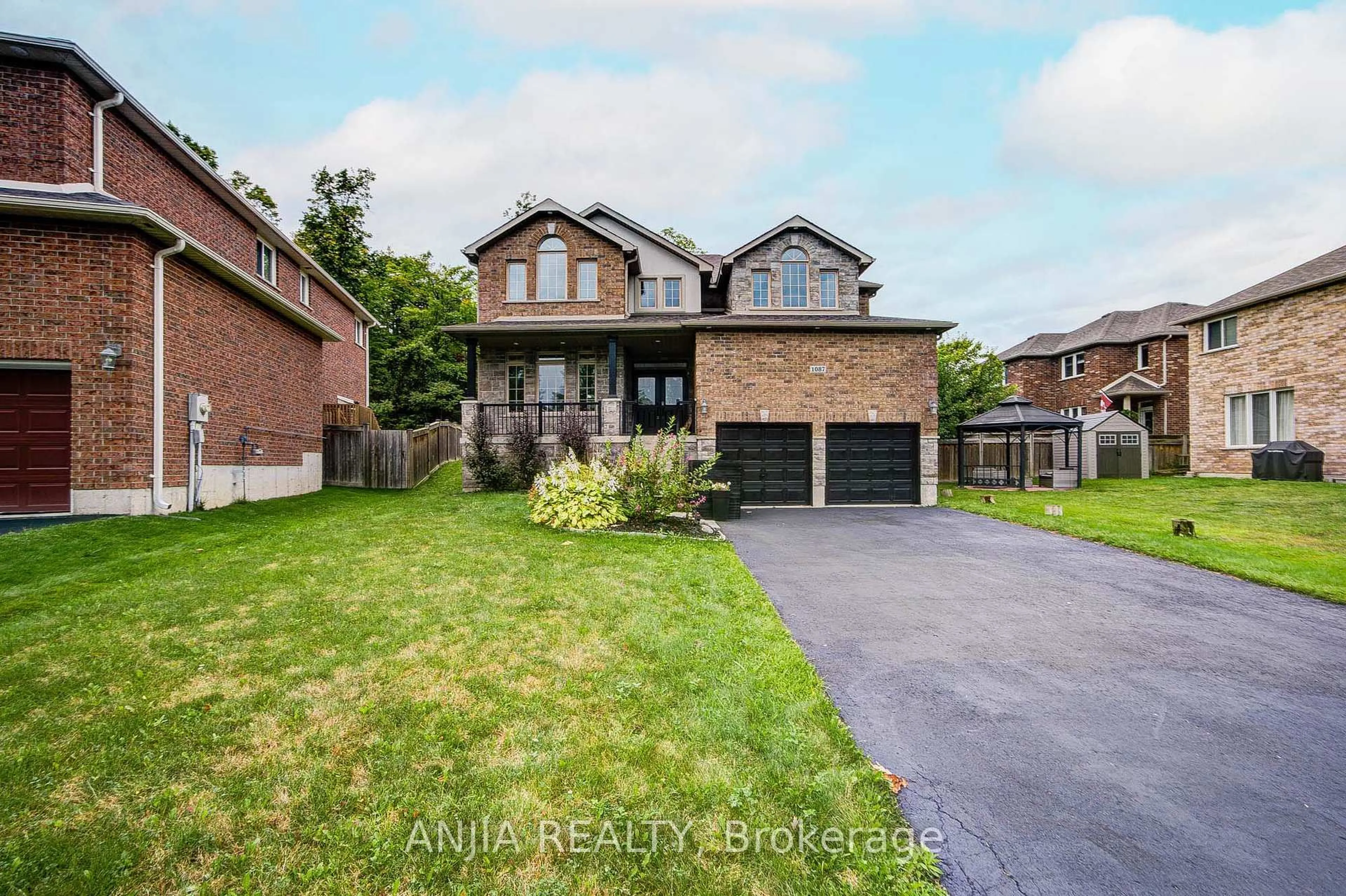 Home with brick exterior material, street for 1087 Nantyr Dr, Innisfil Ontario L9S 0A7