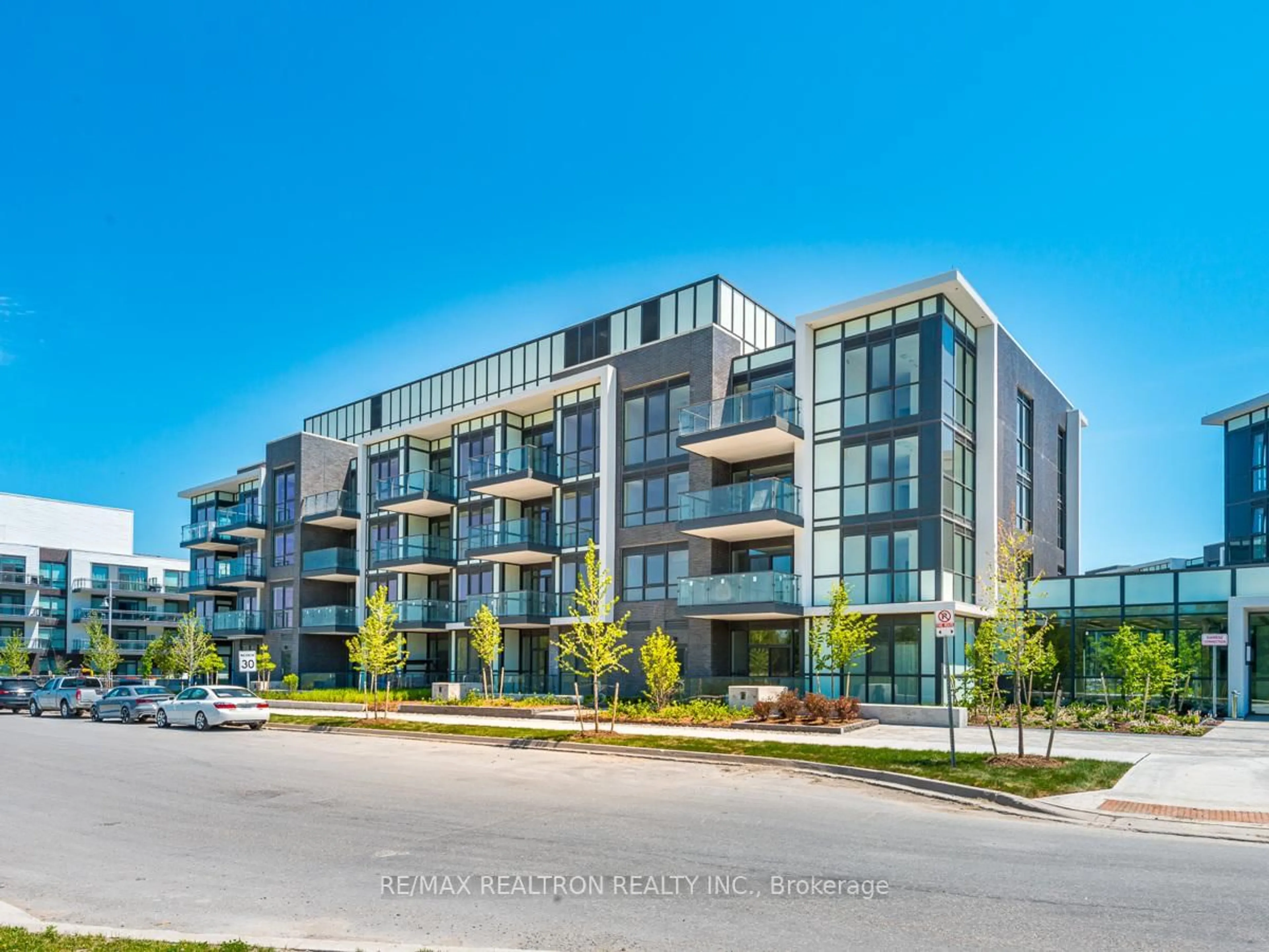 A pic from outside/outdoor area/front of a property/back of a property/a pic from drone, unknown for 375 Sea Ray Ave #209, Innisfil Ontario L9S 2P7